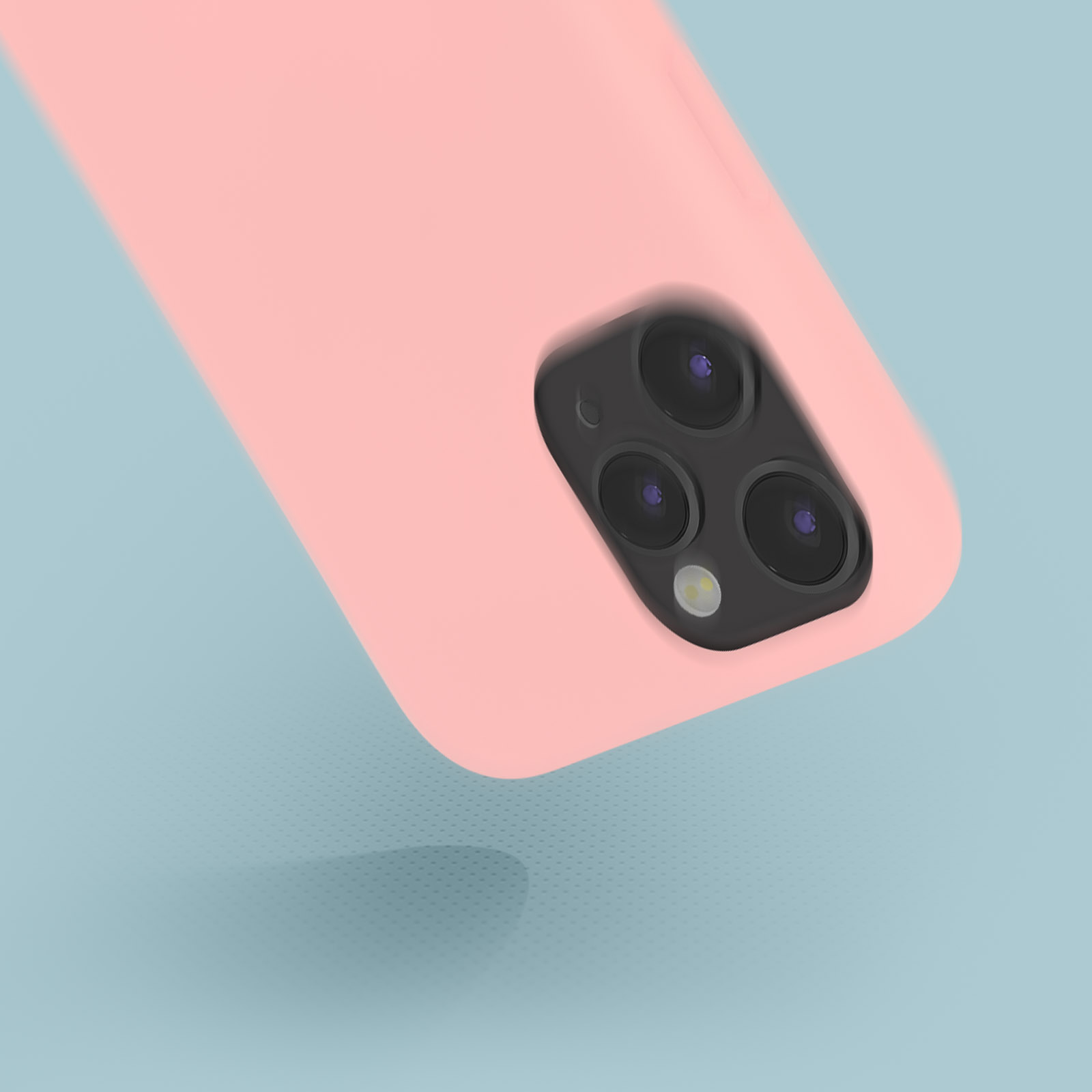Un étui de téléphone rose. Les lentilles de la caméra sont visibles. Le fond est bleu.