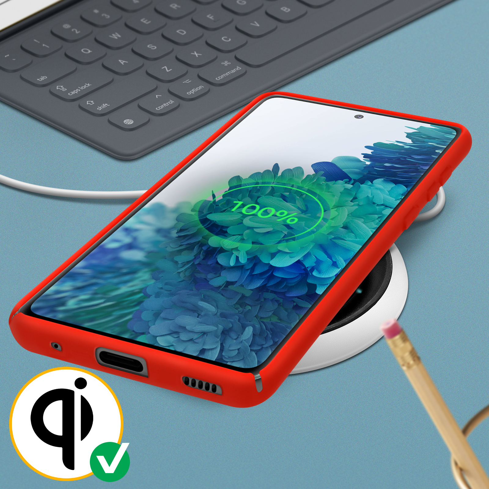 Telefoon oplaadbaar op draadloze pad, rode hoes. Scherm toont 100% opgeladen.