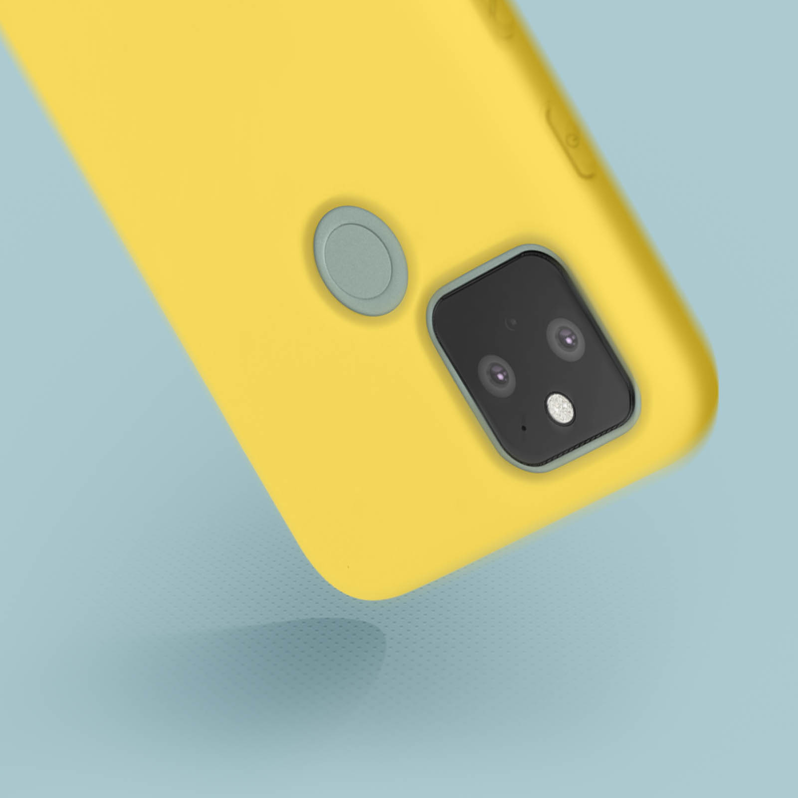 Retro custodia telefono giallo, fotocamera. Sfondo blu, custodia angolata e in caduta.