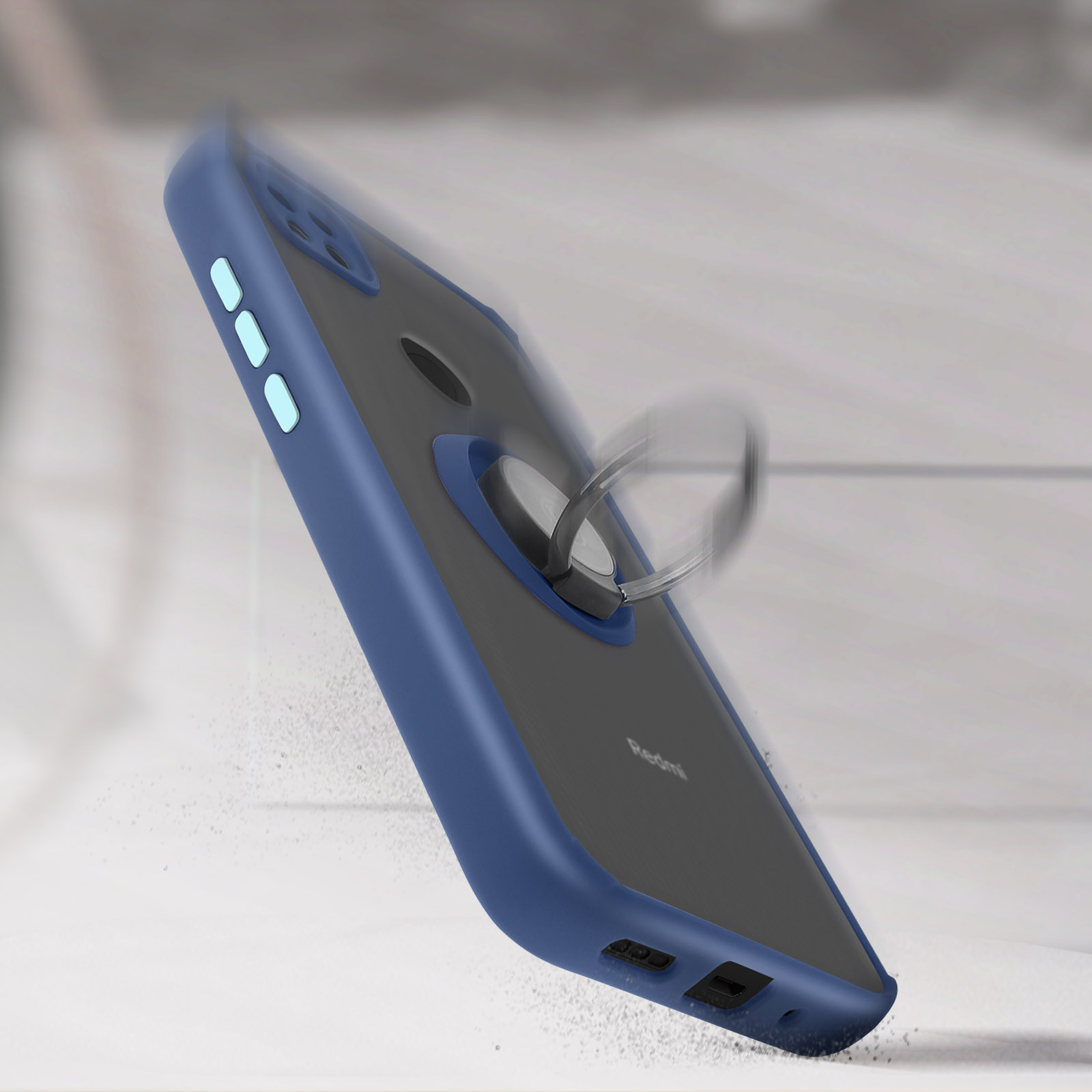 Coque de téléphone bleue avec anneau, sur une surface. Particules de poussière blanches visibles.