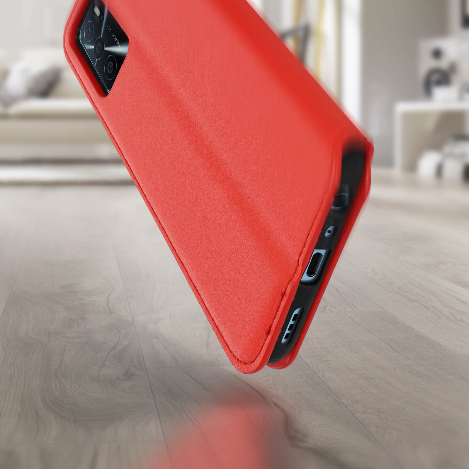 Étui de téléphone rouge. L'étui est légèrement incliné. Caméra et boutons visibles. L'étui est rouge.