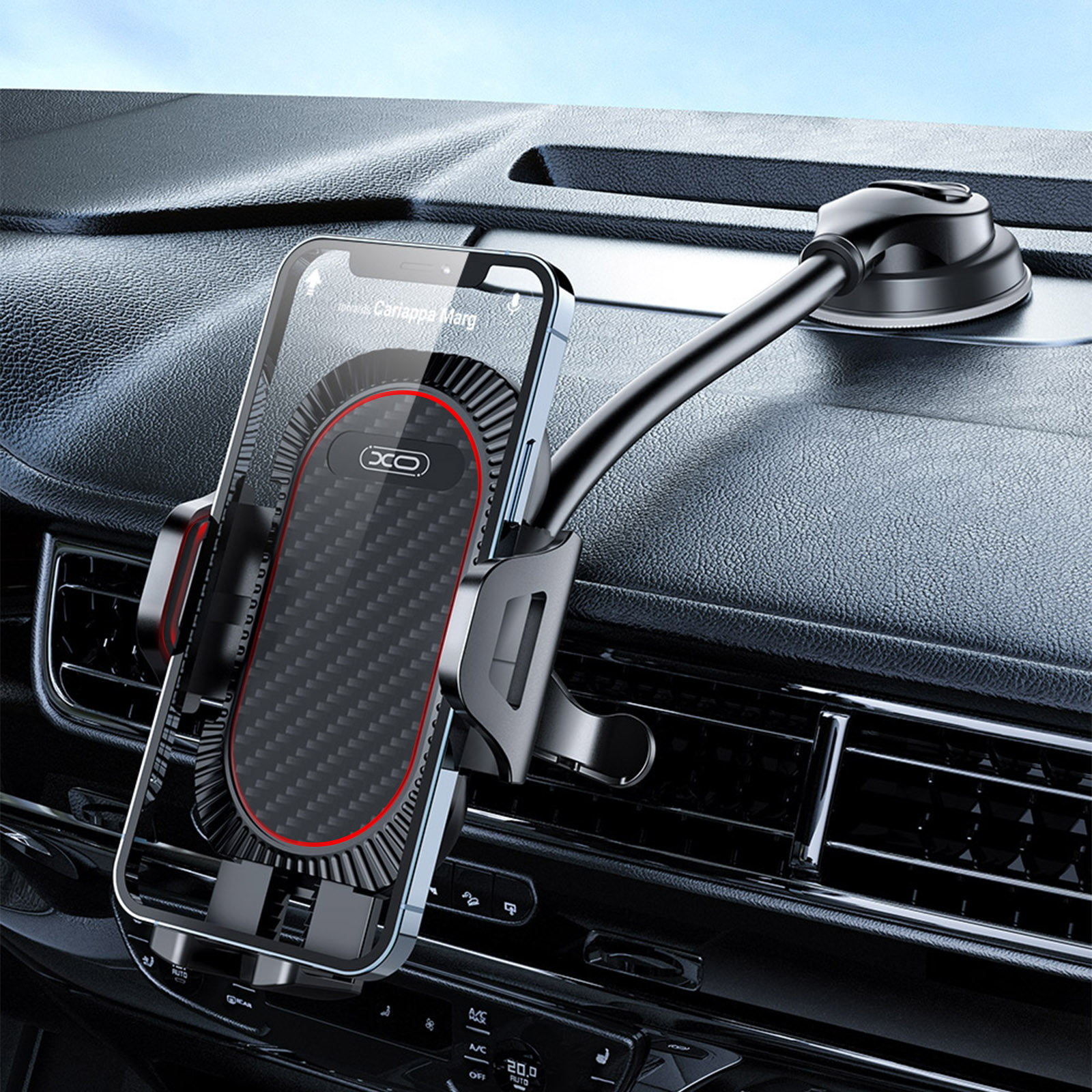 Ein Telefon, das mit einer Telefonhalterung in einem Auto montiert ist. Das Telefon zeigt einen Anrufbildschirm an. Armaturenbrett im Hintergrund.