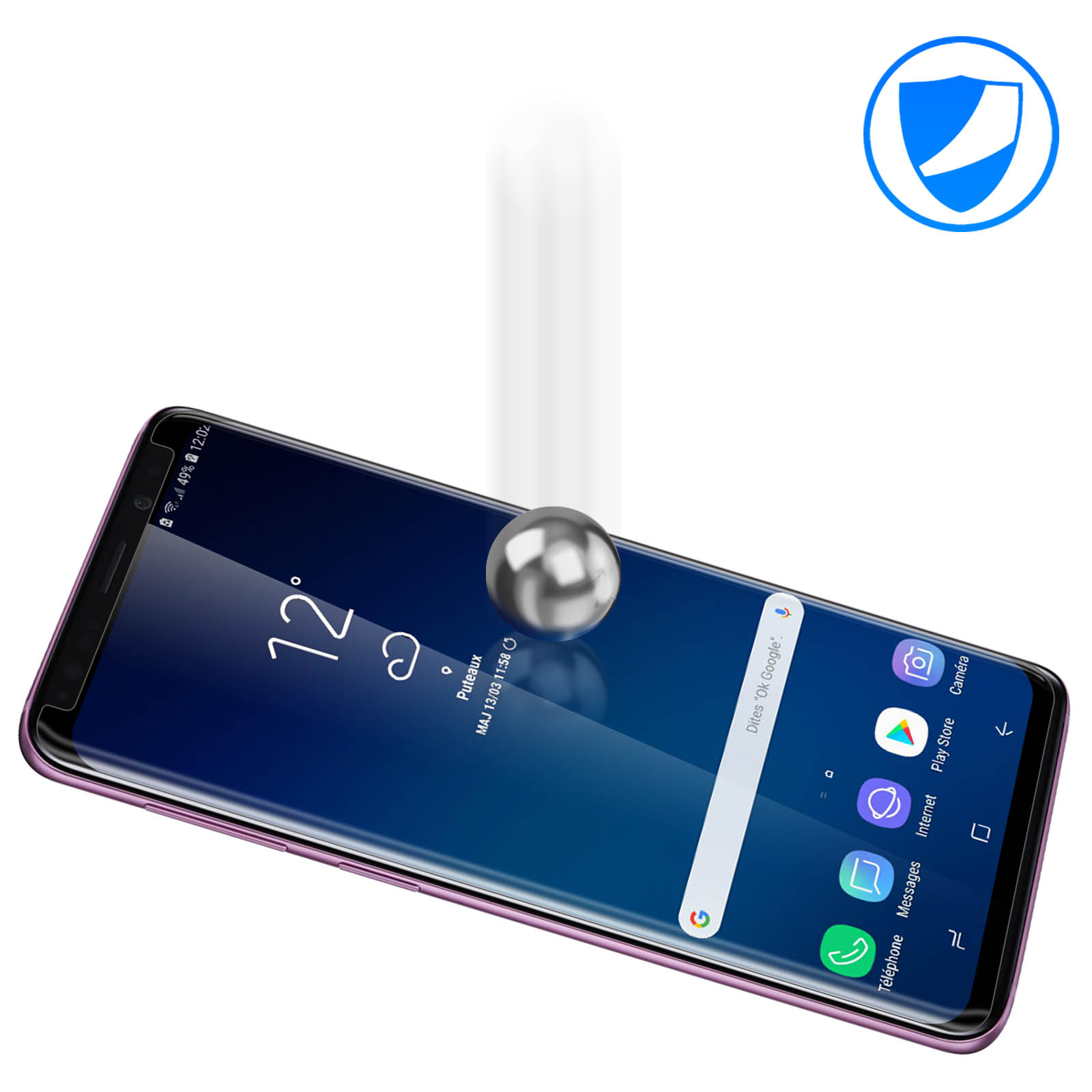 Un telefono con una protezione per lo schermo. Una sfera di metallo cade verso il telefono. Schermo blu del telefono.