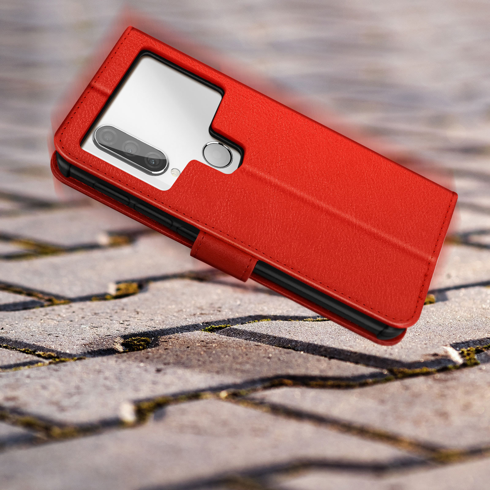 Custodia per telefono rossa, chiusa, su superficie in pietra. Il telefono è parzialmente visibile.