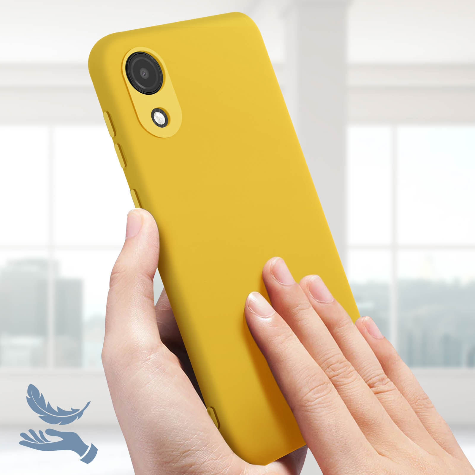 Un telefono giallo in una mano. Il telefono è giallo e una mano lo tiene.