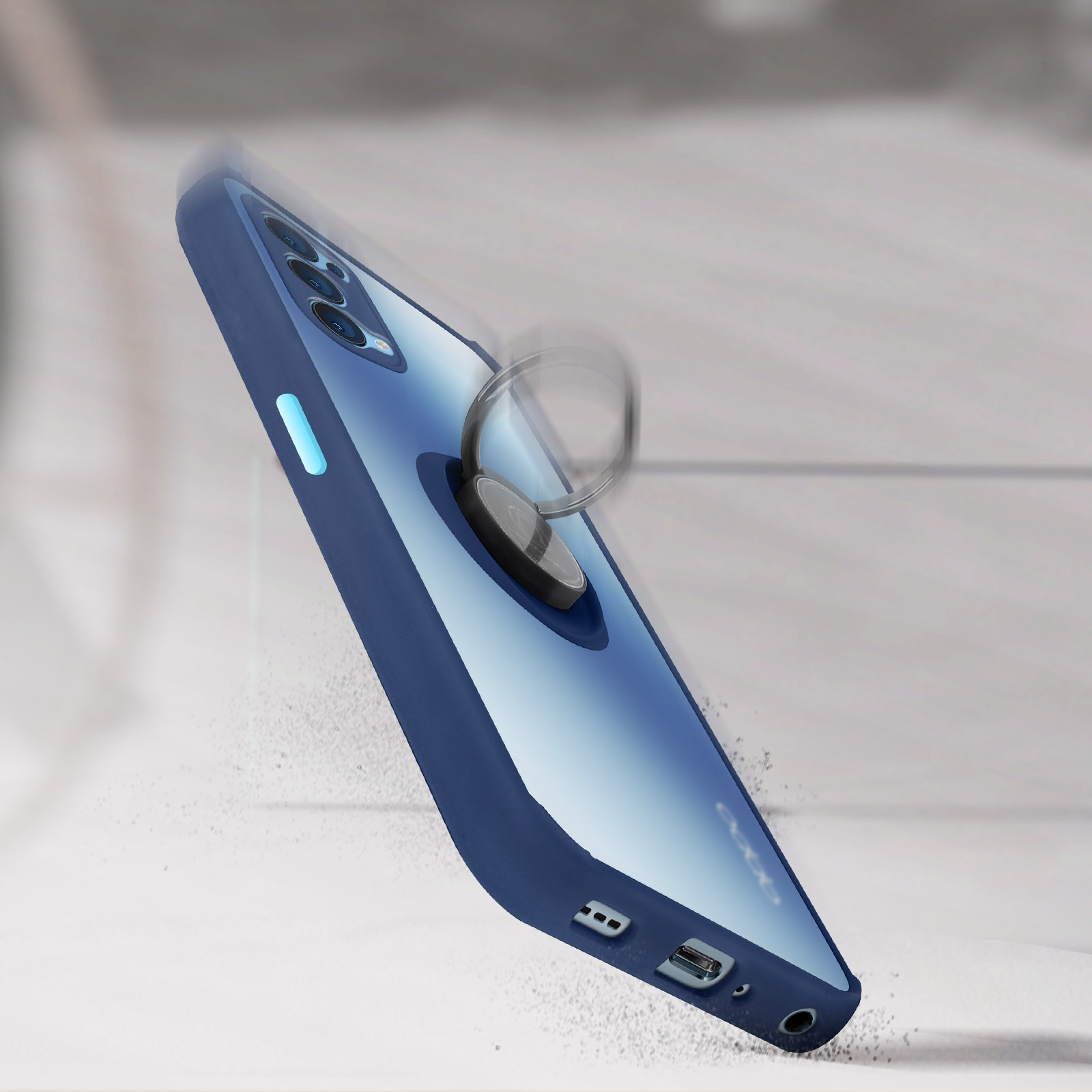 Custodia blu per telefono con anello. Il telefono è inclinato, con sfondo sfocato.