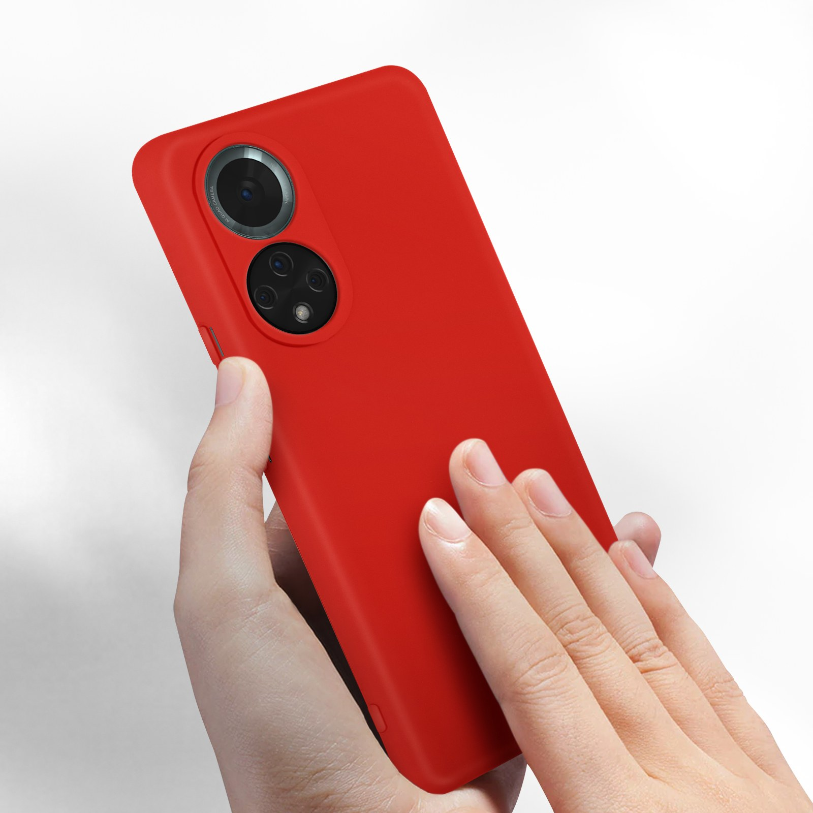 Mano che tiene una custodia rossa con lenti della fotocamera visibili.