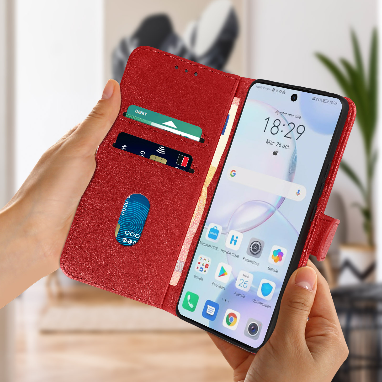 Mani di donna che tengono una custodia per telefono a portafoglio rossa. Viene visualizzato uno schermo del telefono.