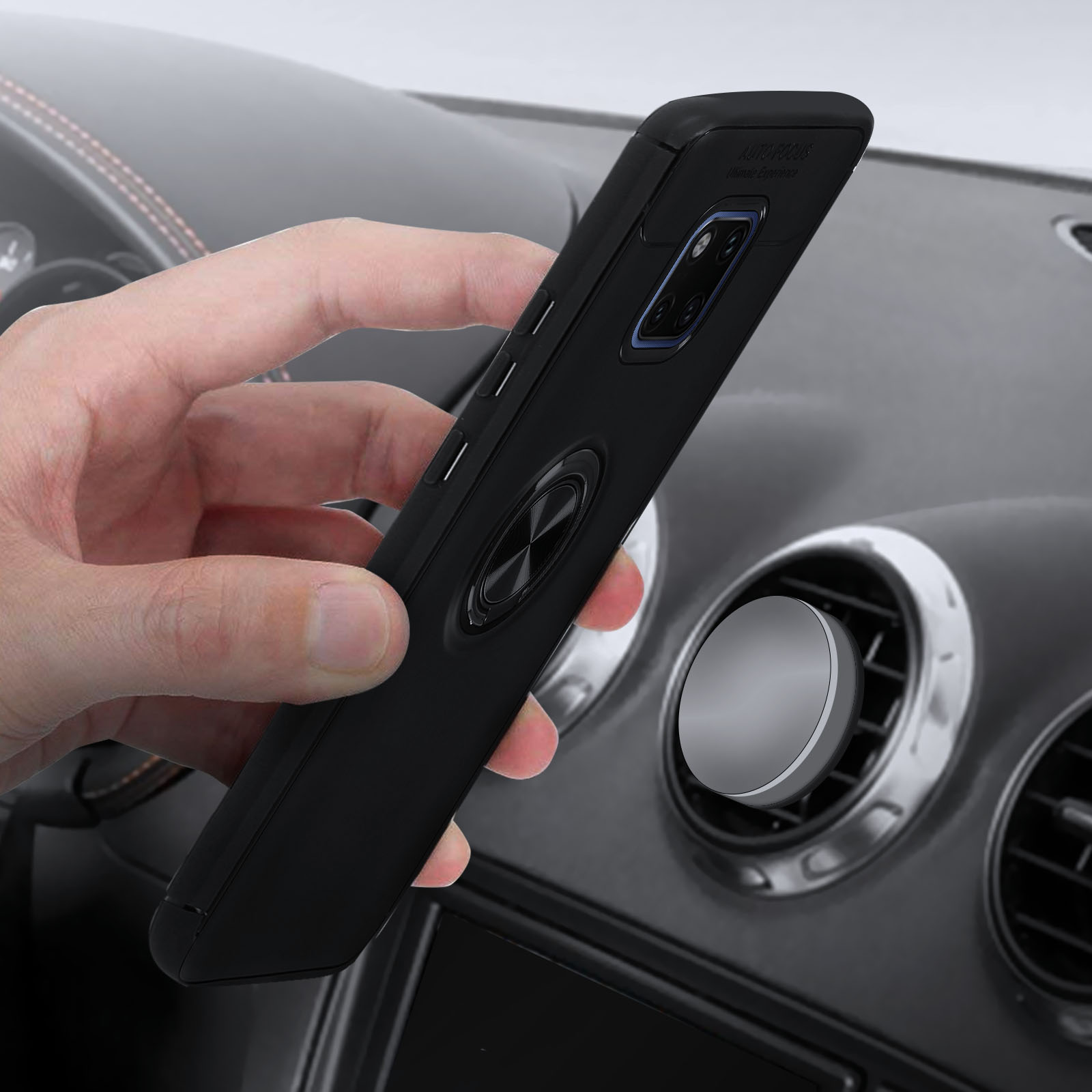 Custodia nera per telefono con supporto ad anello magnetico, tenuta in mano, in un'auto.