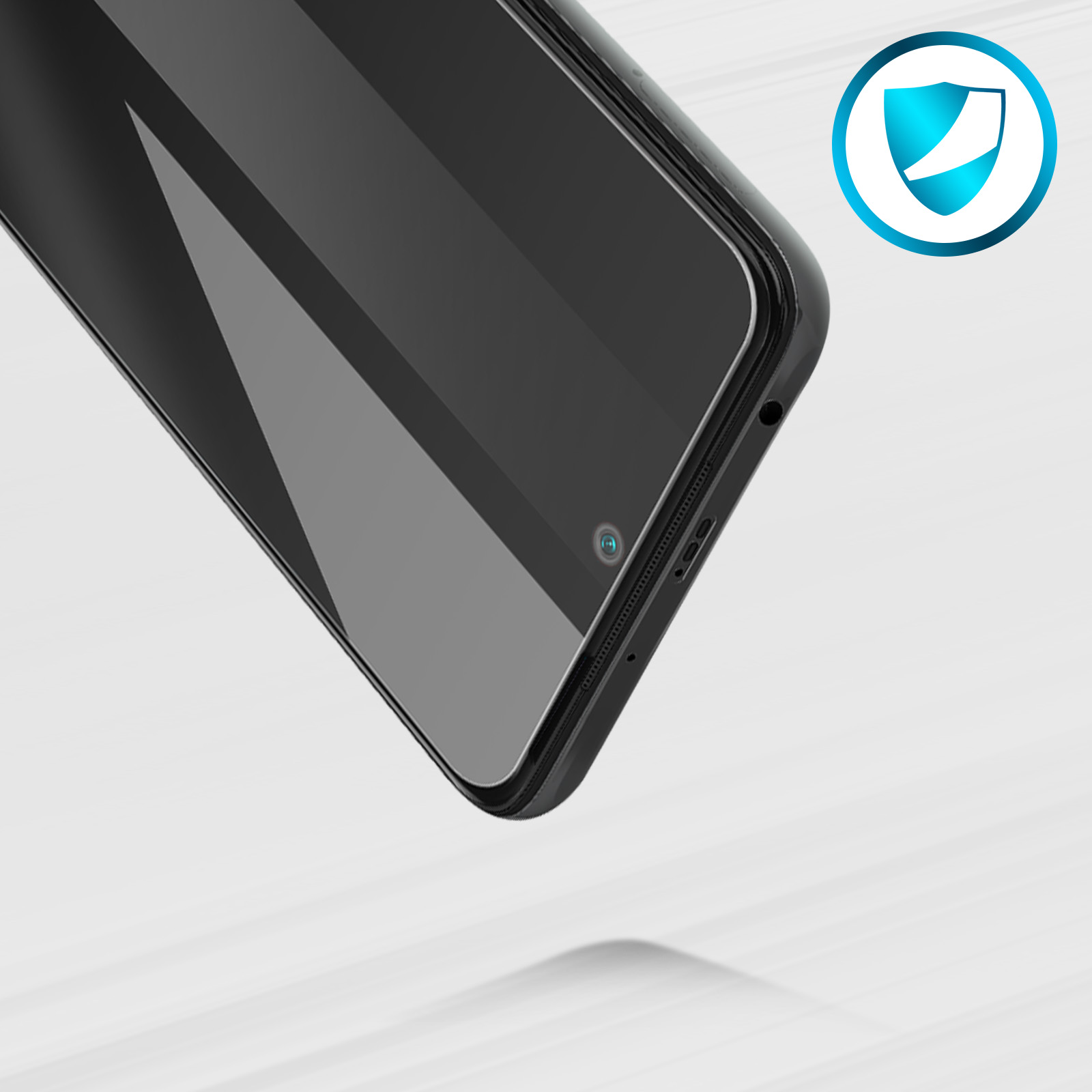Primo piano di uno smartphone nero con icona scudo protettivo. Lo schermo riflette, lo sfondo è sfocato.