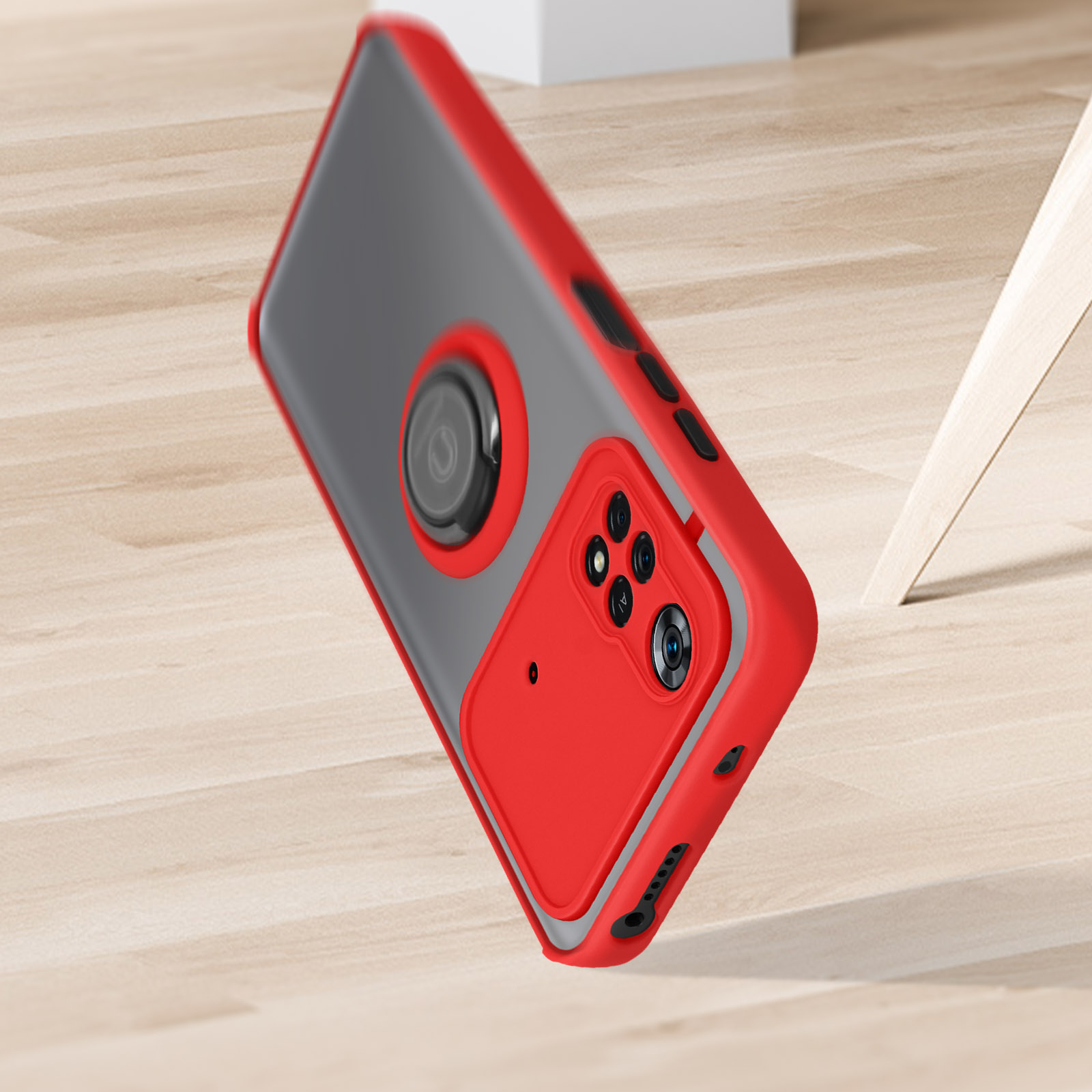 Una custodia rossa per telefono con un telefono all'interno. Pavimento in legno sullo sfondo.
