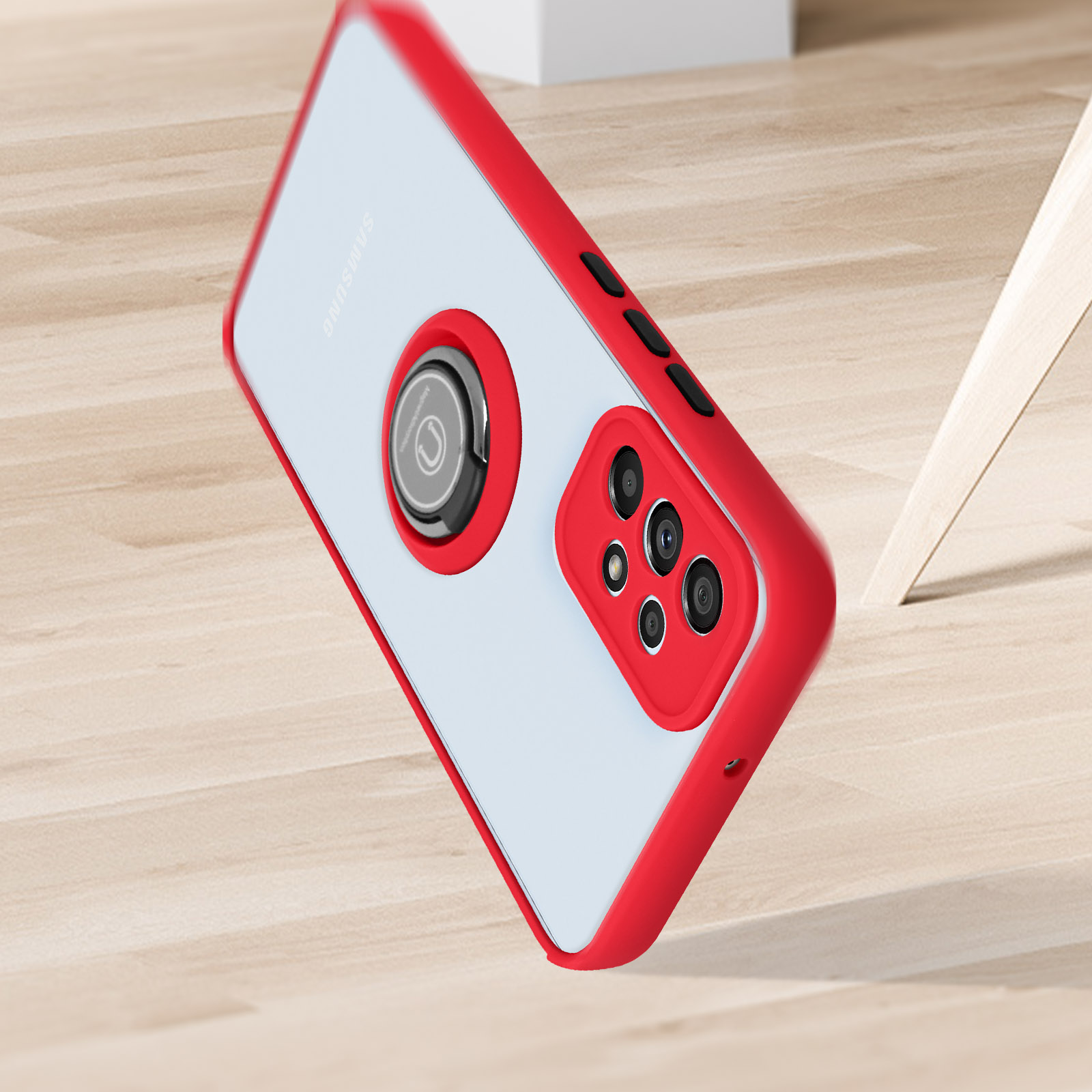 Een rode telefoonhoes met een ringhouder en een telefoon. Het ligt op een houten oppervlak.