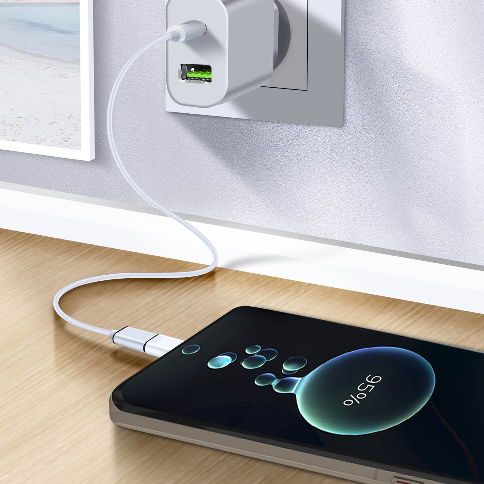 Telefon ładujący się za pomocą białej ładowarki podłączonej do ściany. Ekran pokazuje procent naładowania.