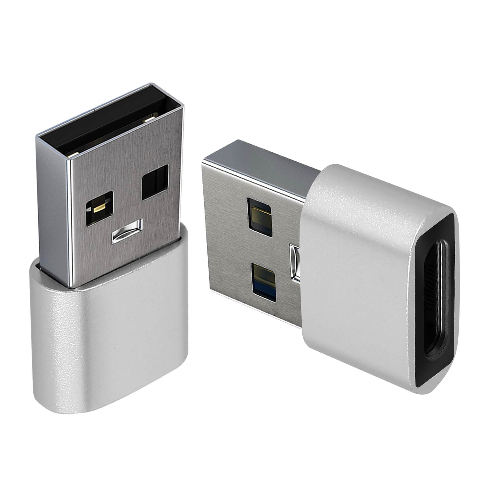 Due adattatori USB argentati. Sfondo bianco.
