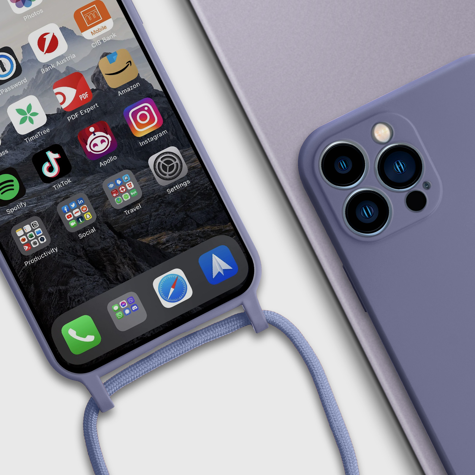 Téléphone avec icônes et coque, à côté d'un autre téléphone.