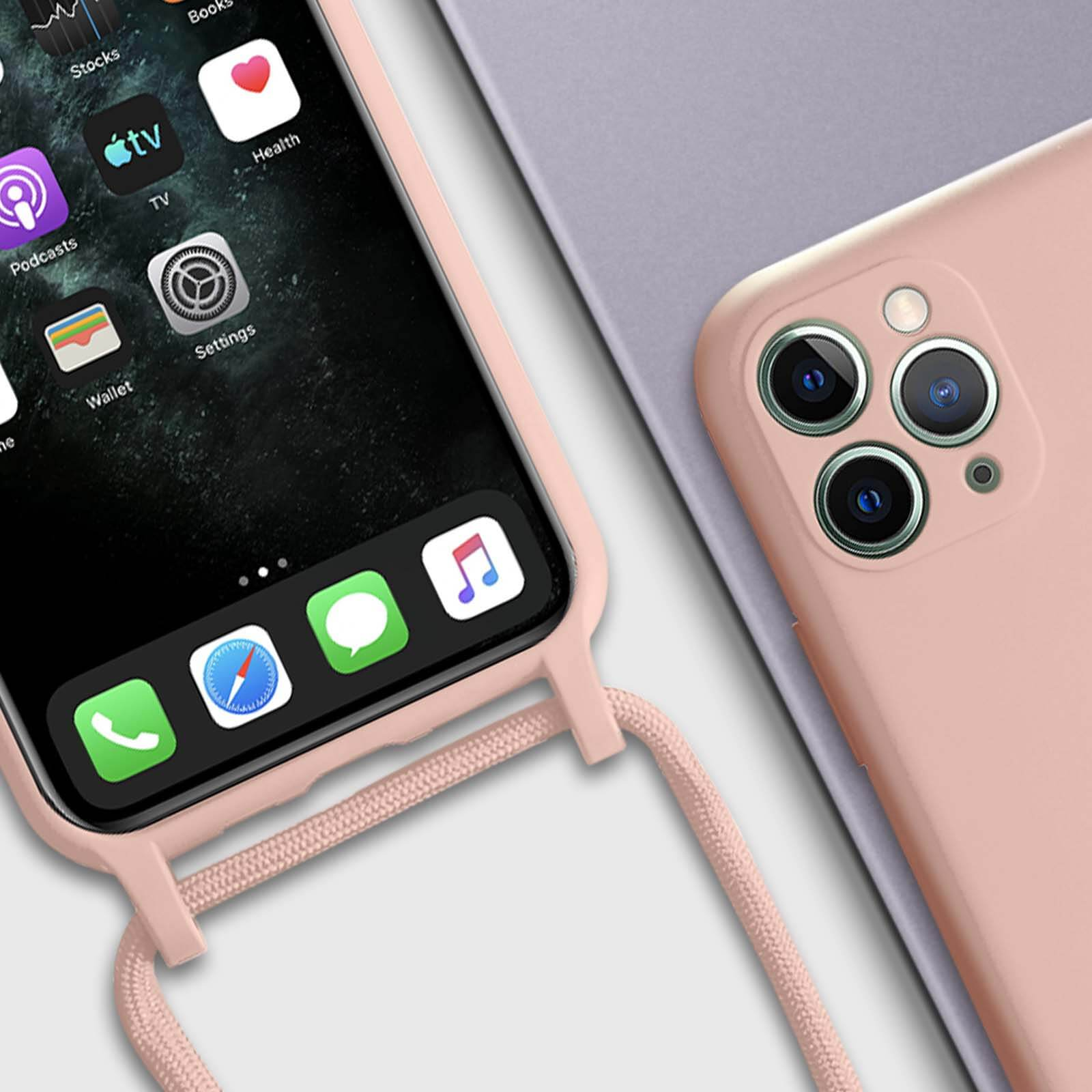Un téléphone rose avec un cordon et un étui rose clair. Le téléphone est à côté d'un téléphone lavande.