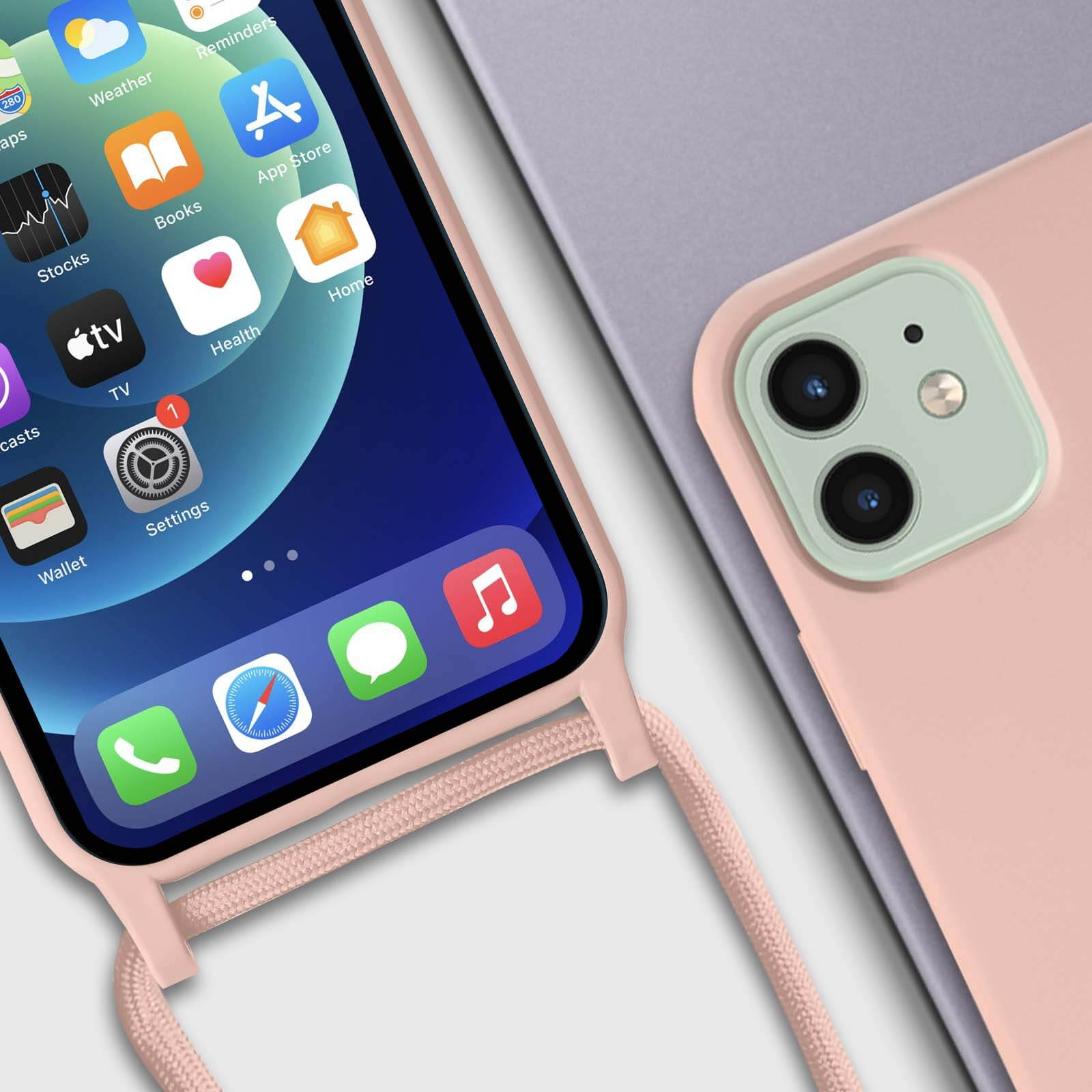 Nahaufnahme eines Telefons mit Apps auf dem Bildschirm. Ein rosa Kabel ist befestigt. Ein weiteres Gehäuse ist sichtbar.