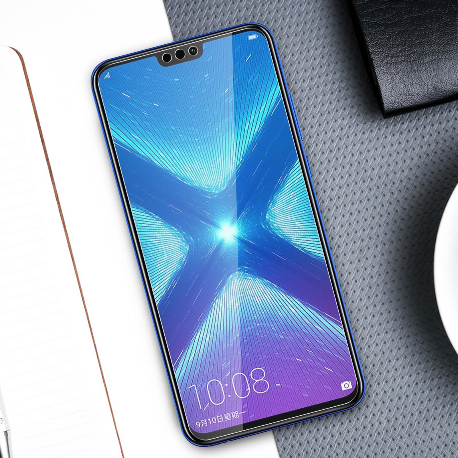 Un smartphone avec un écran bleu et une lumière vive.