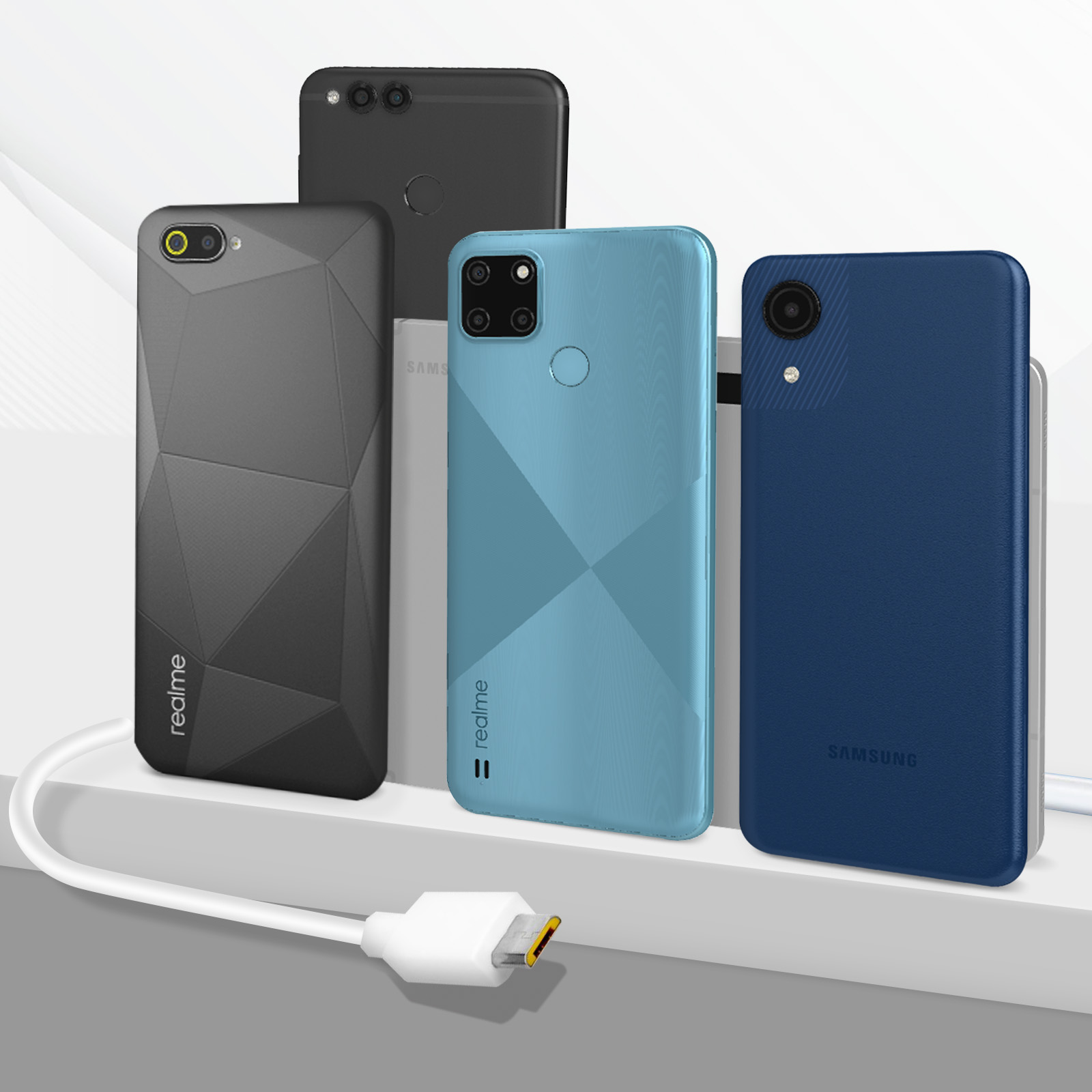 Vier Telefone in einer Reihe mit angeschlossenem Ladekabel. Verschiedene Farben und Designs.