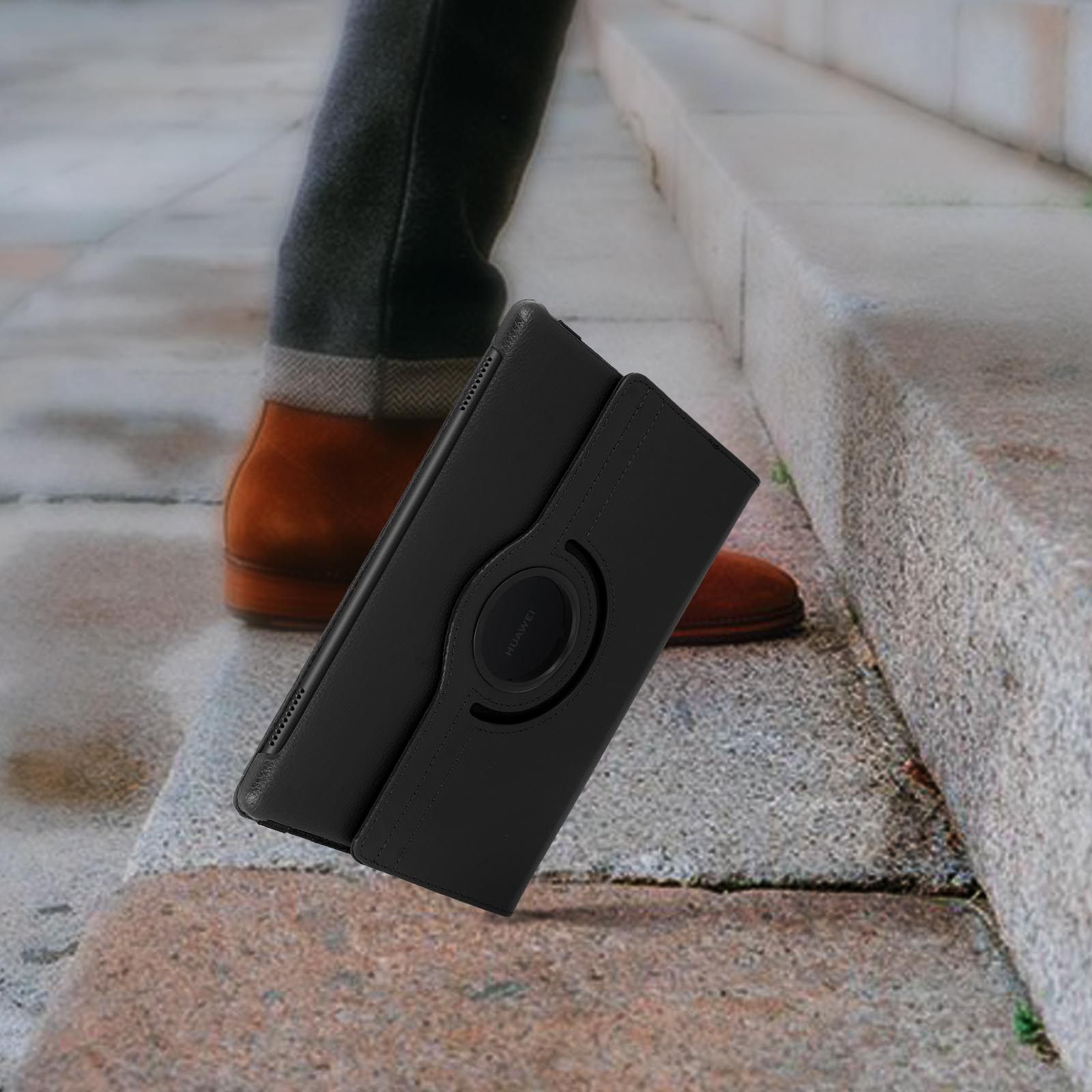 Custodia nera con telefono nero. Il telefono è su un gradino.