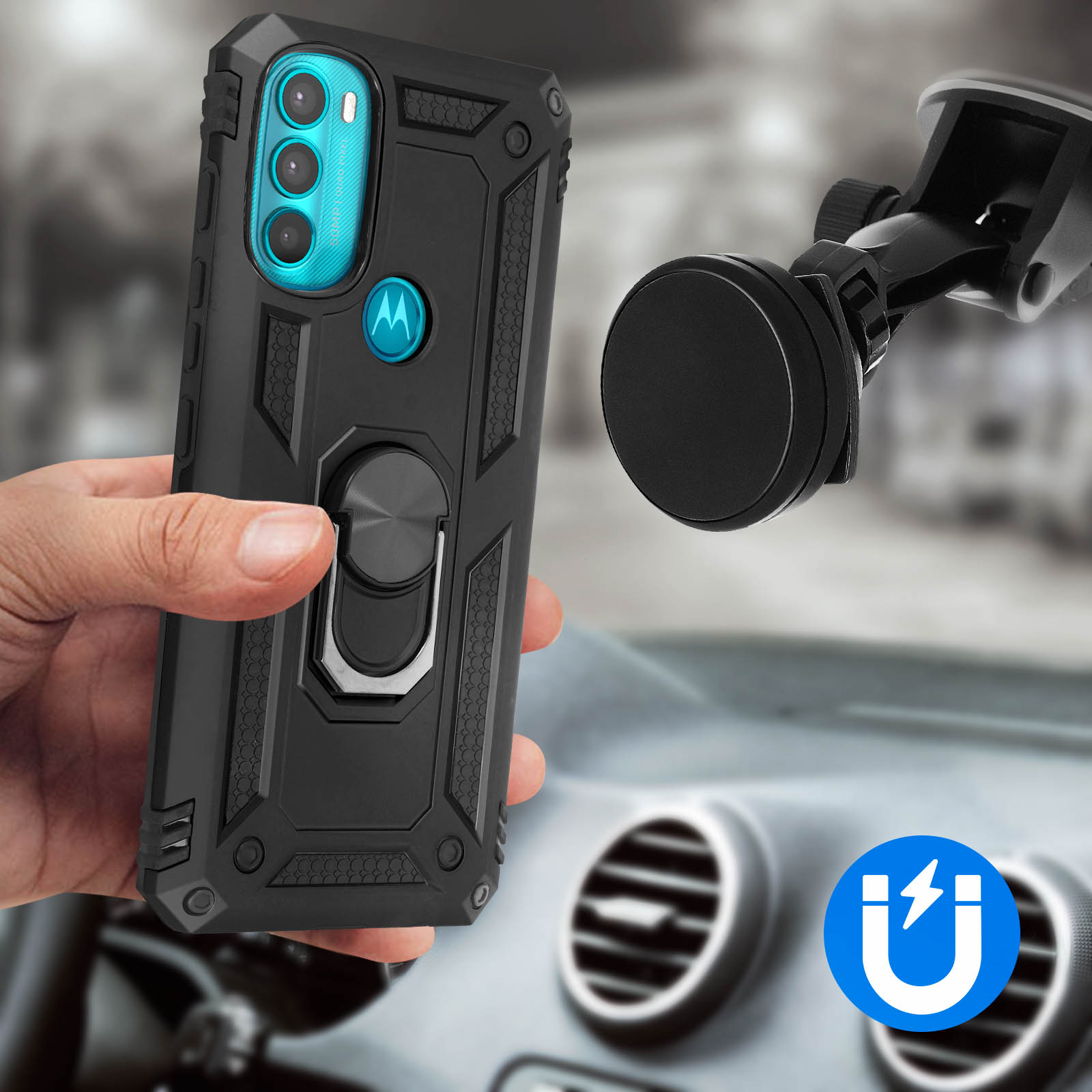 Mano che tiene una custodia nera per telefono con anello di supporto. È visibile una presa d'aria dell'auto.