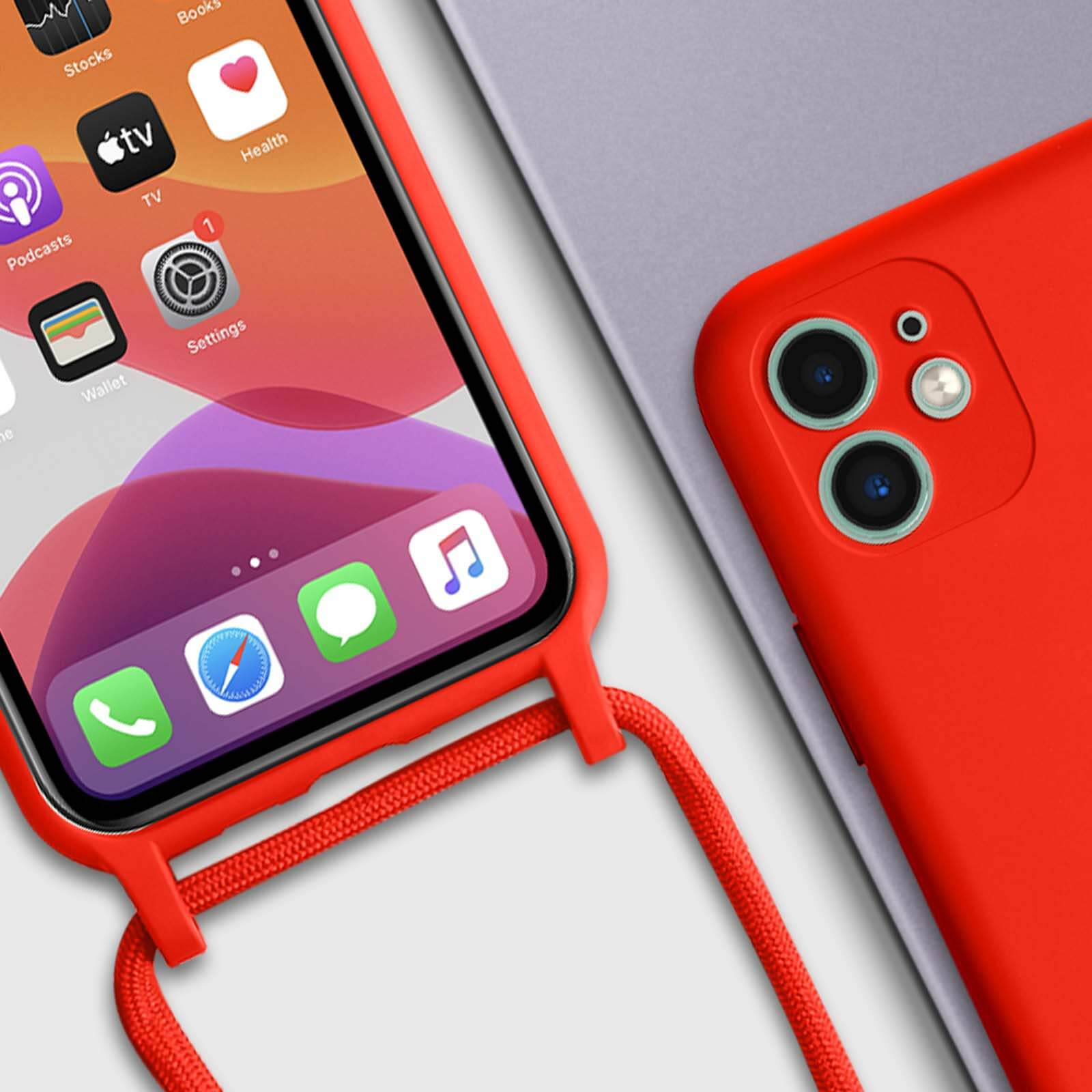 Téléphone rouge avec sangle rouge. Un téléphone violet est à côté.