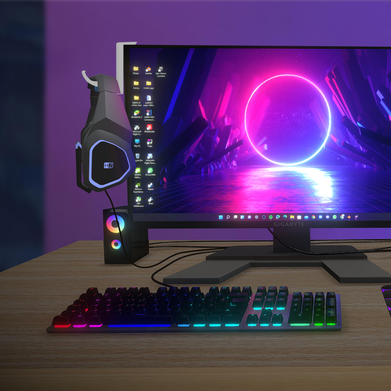 Configuración gaming: teclado con luces arcoíris, auriculares, monitor con círculo neón.