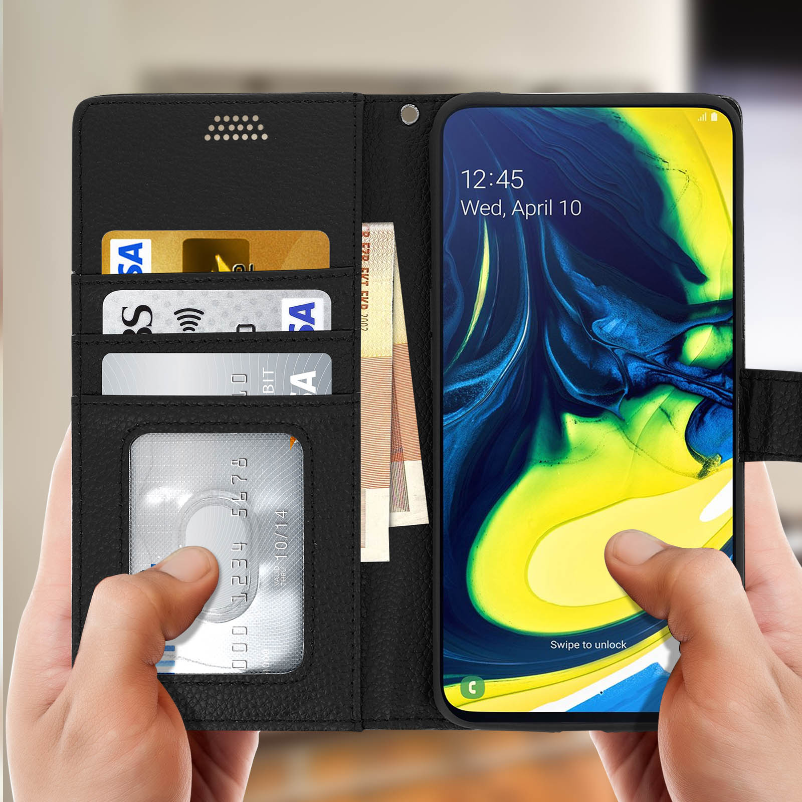 Telefono in una custodia a portafoglio nera aperta. Carte di credito e contanti nel portafoglio.
