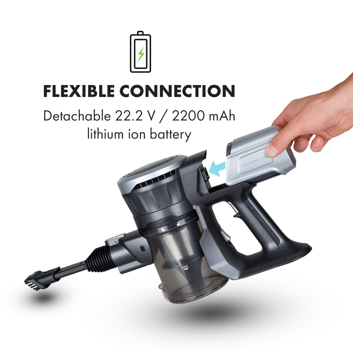 Eine Hand setzt einen Akku in einen schwarz-grauen kabellosen Staubsauger ein.