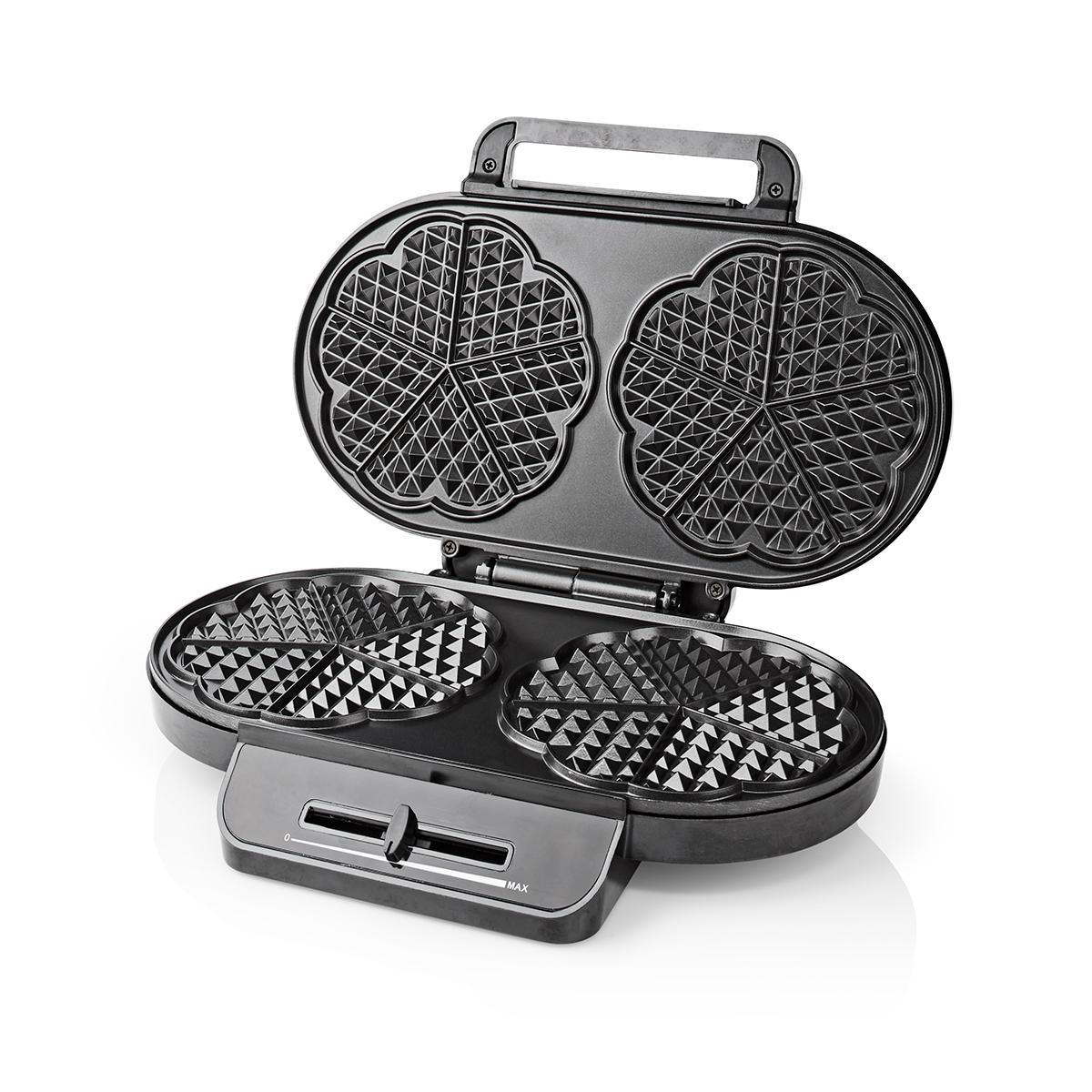 Una macchina per waffle aperta. Le parti superiore e inferiore mostrano le forme dei waffle. Il pannello di controllo è visibile.