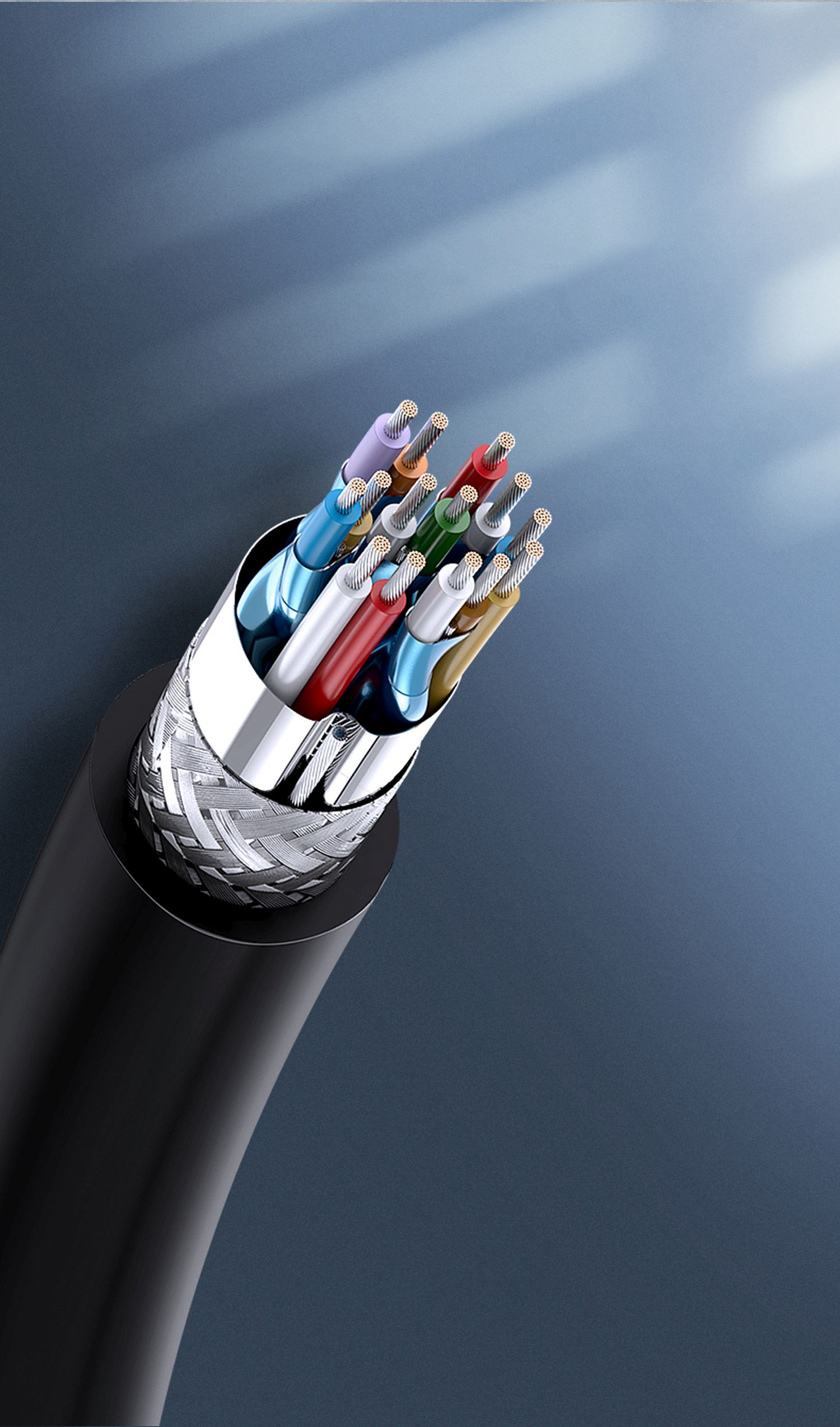 Nahaufnahme eines aufgeschnittenen Kabels mit farbigen Drähten; das Kabel ist schwarz mit silbernem Stecker.