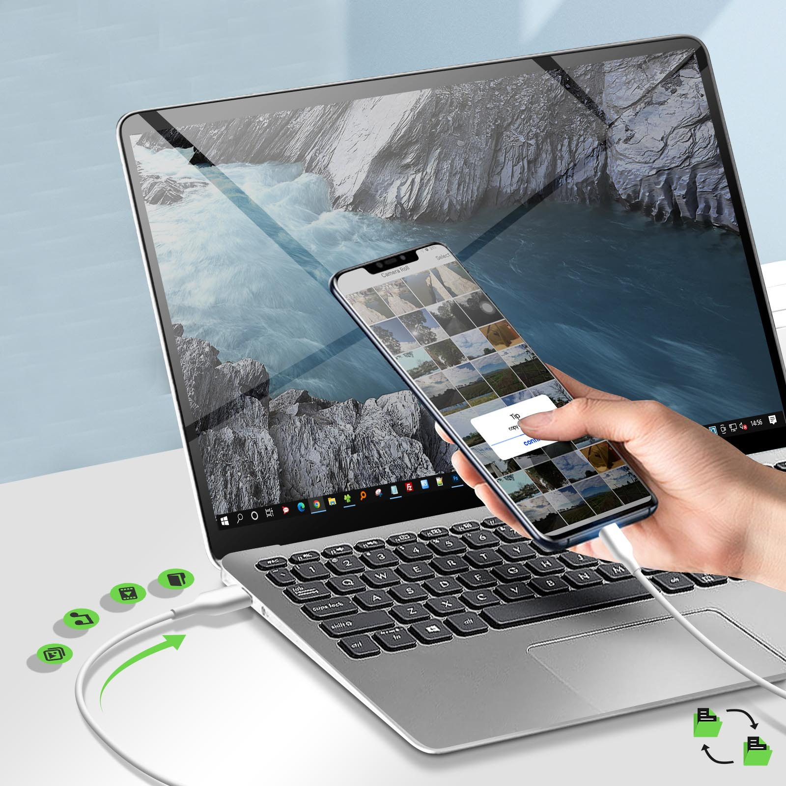 Laptop con telefono che mostra foto, collegato tramite USB. Le icone verdi indicano il trasferimento dati.