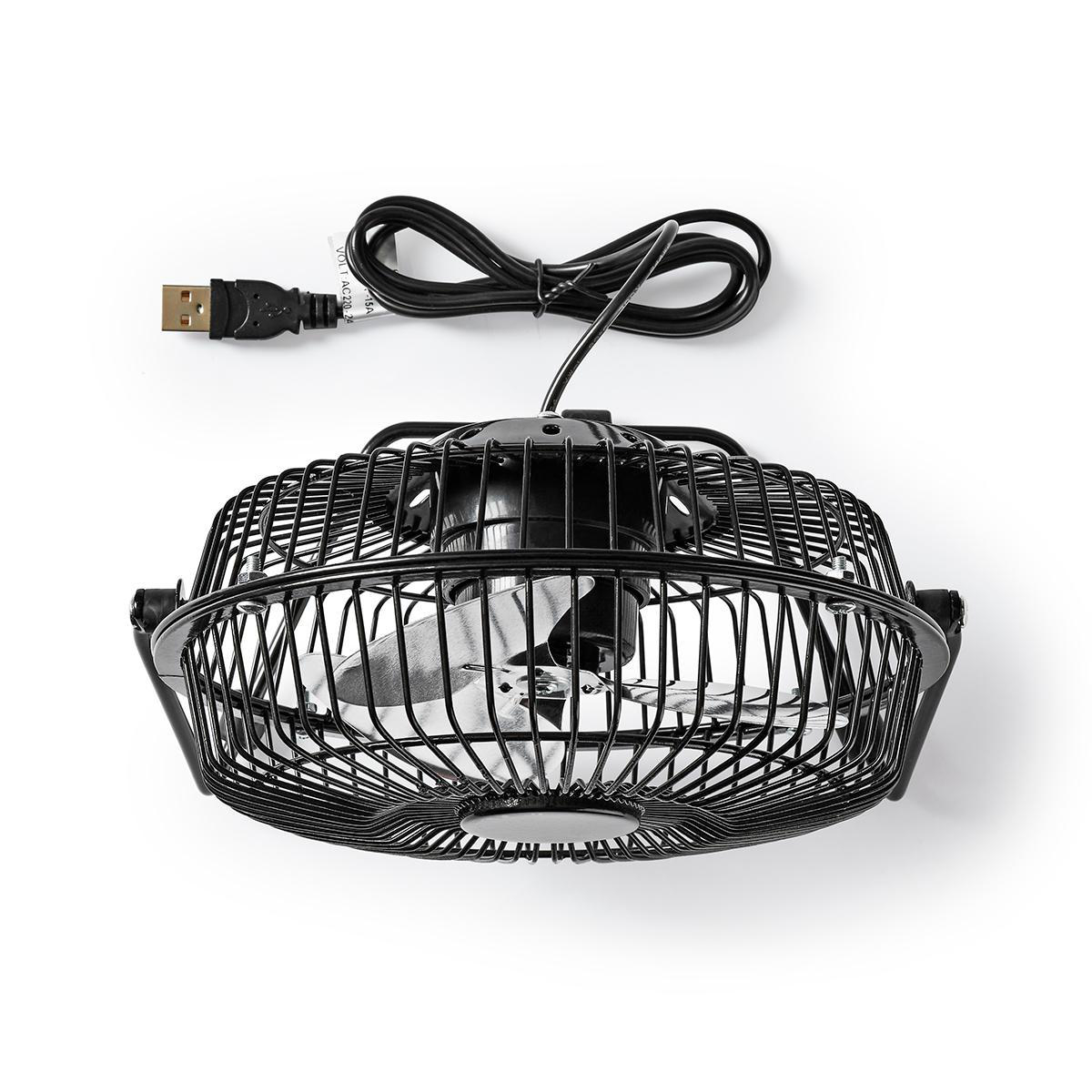 Una ventola USB nera con griglia metallica e pale visibili.