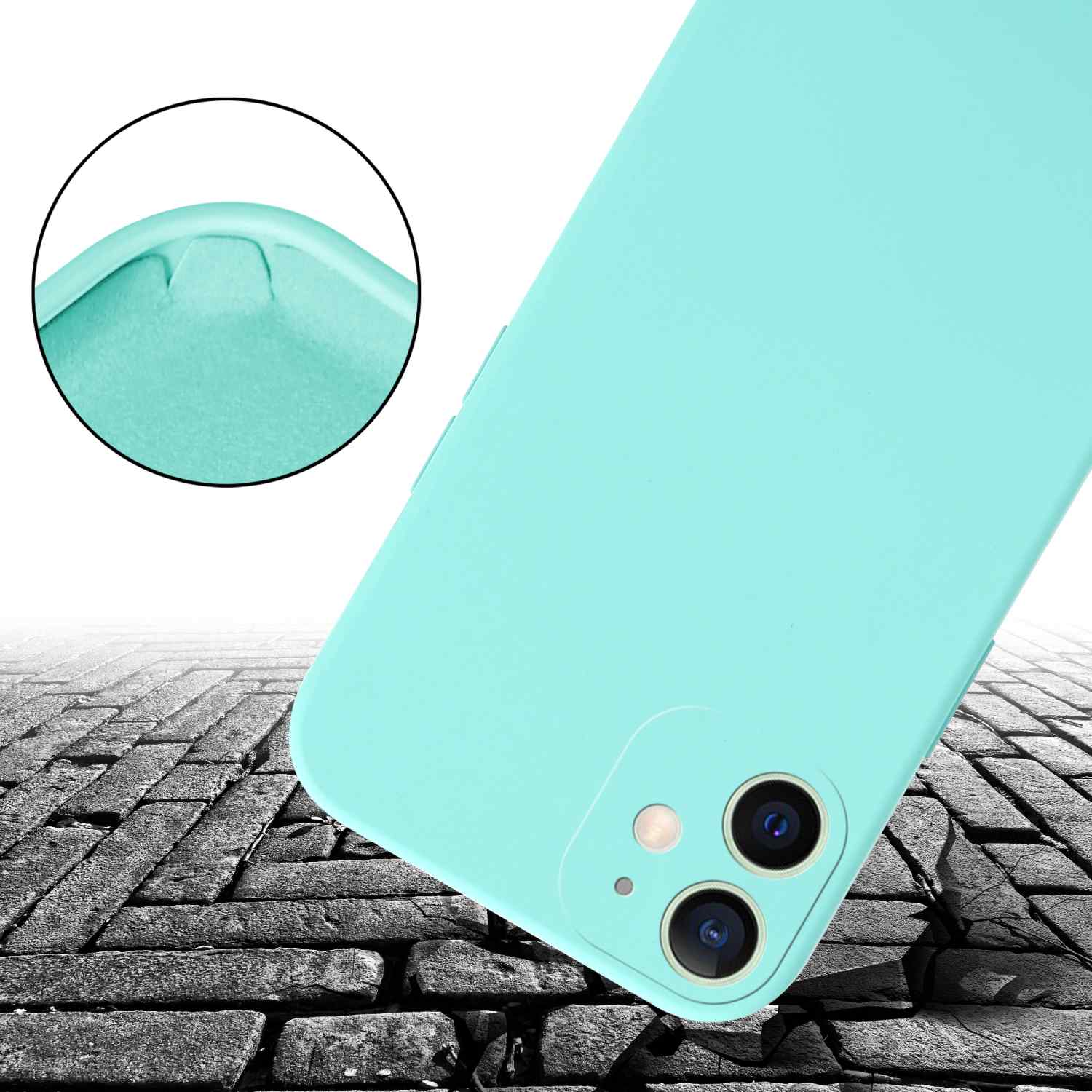 Un telefono in una custodia verde menta su una superficie di mattoni. La custodia ha un ritaglio per la fotocamera.