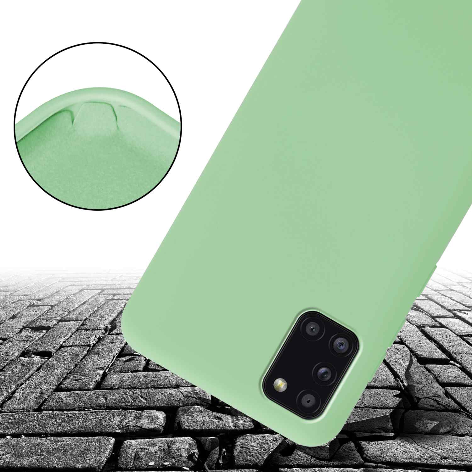 Custodia verde per telefono su superficie in mattoni. Primo piano sull'angolo.