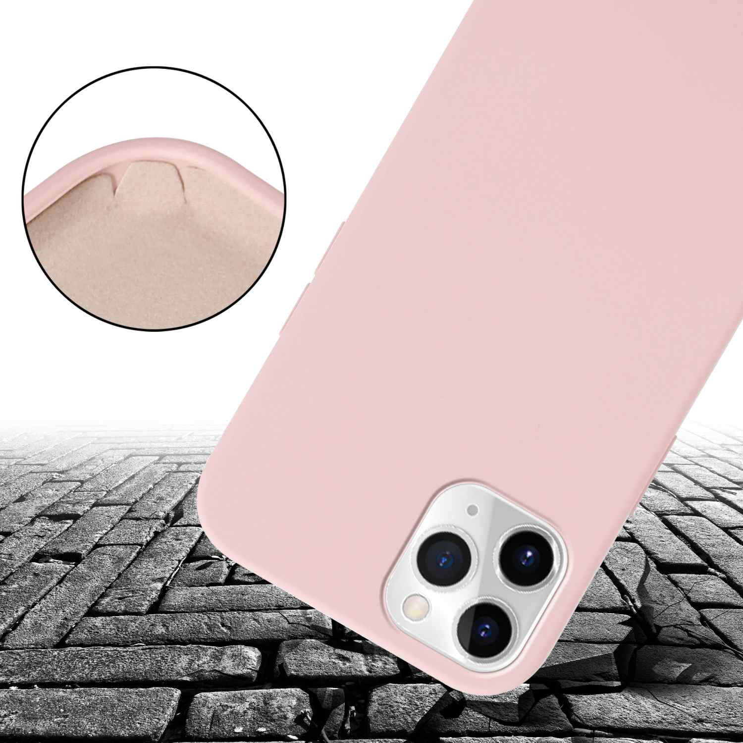 Nahaufnahme einer rosa Handyhülle, Ecke und Rückseite mit Kameralinsen auf Stein.