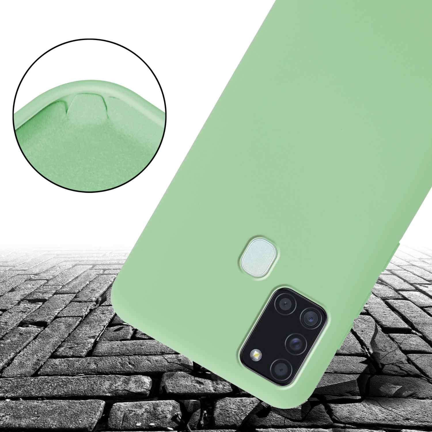 Una custodia per telefono verde chiaro, angolata, con un primo piano di un angolo e uno sfondo di mattoni crepati.