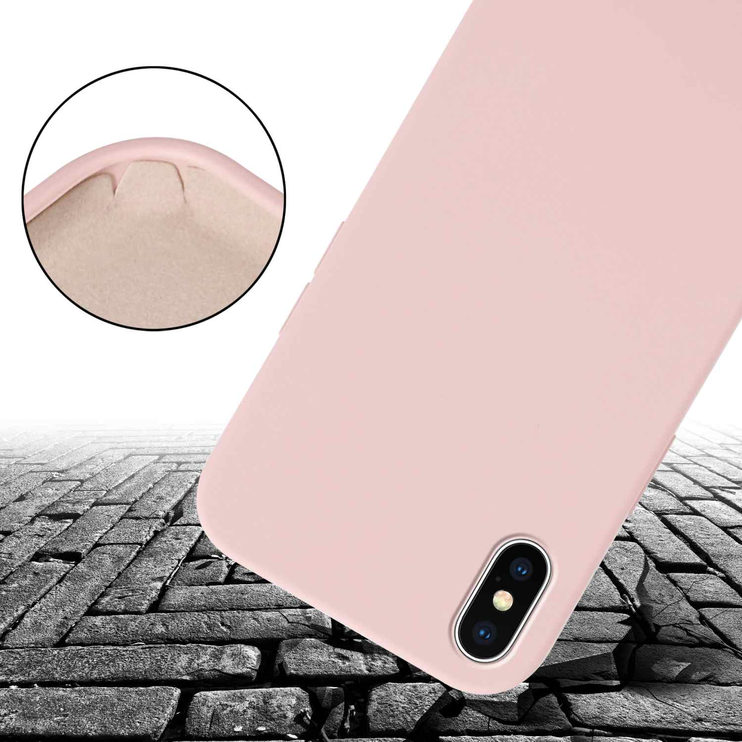 Custodia rosa per telefono con dettaglio del bordo, su superficie strutturata a motivo mattone.