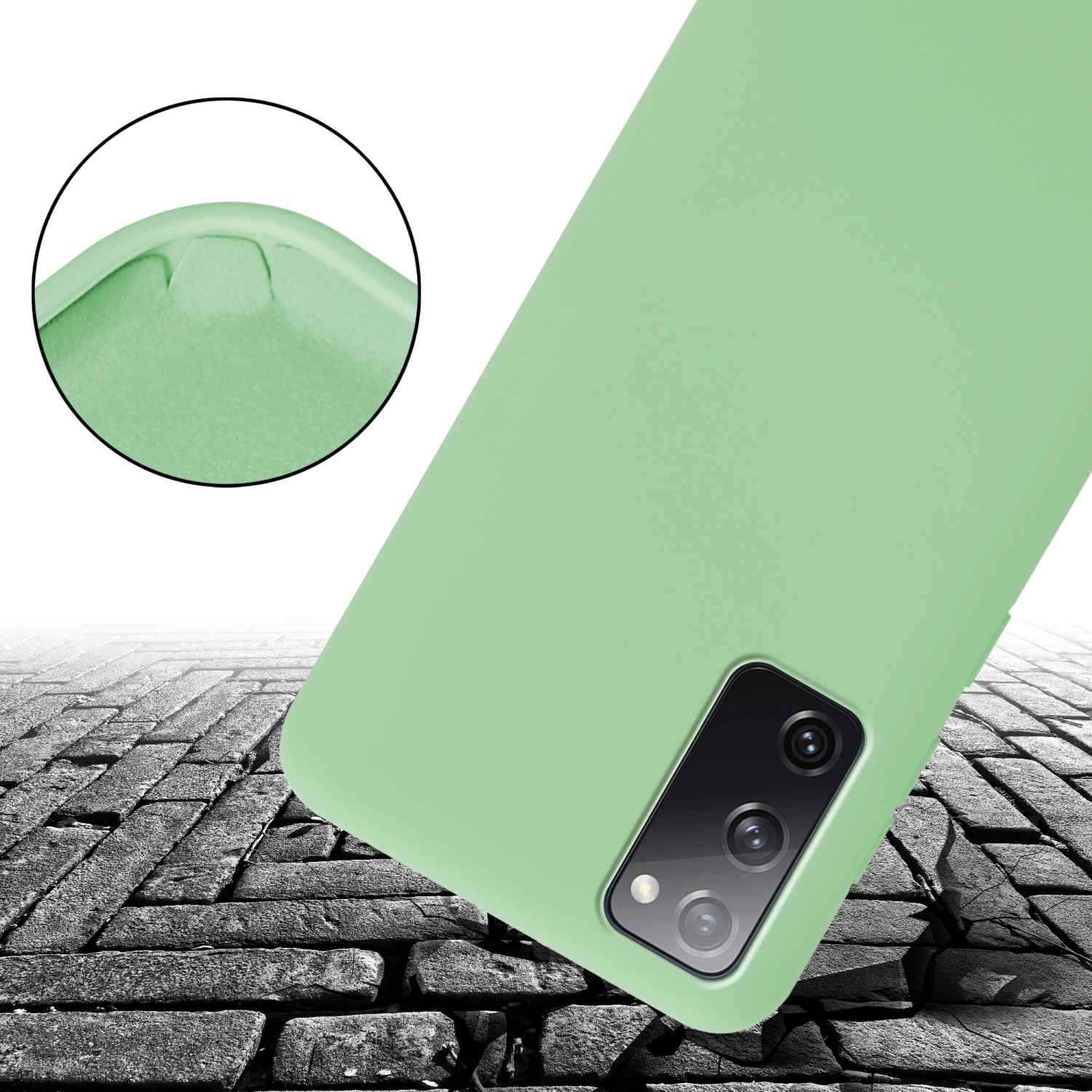 Custodia per telefono verde angolata su superficie in pietra, sezione fotocamera visibile.