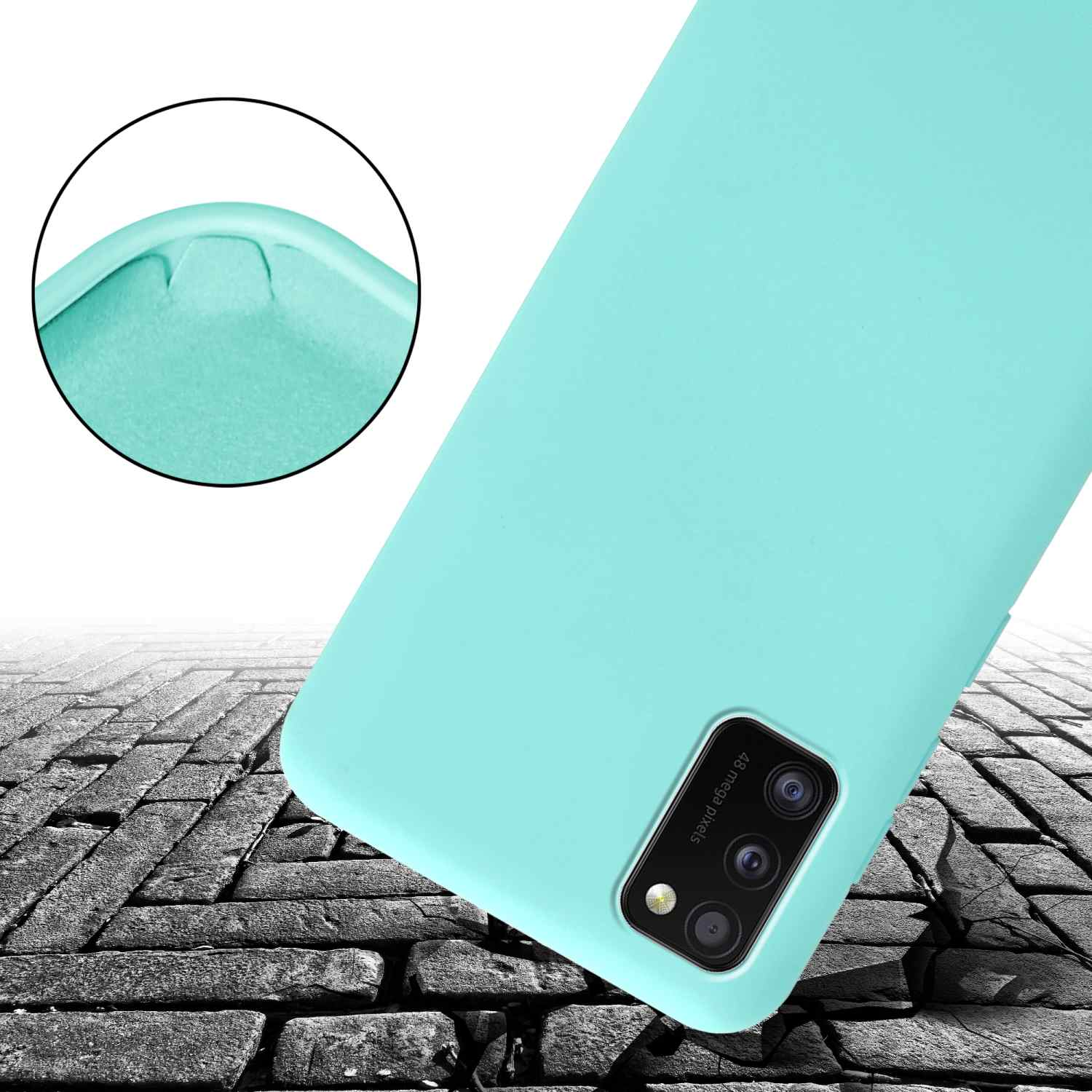 Una custodia per telefono color turchese su una superficie di mattoni rotti. La custodia ha un ritaglio per la fotocamera e le parole 48 megapixel.