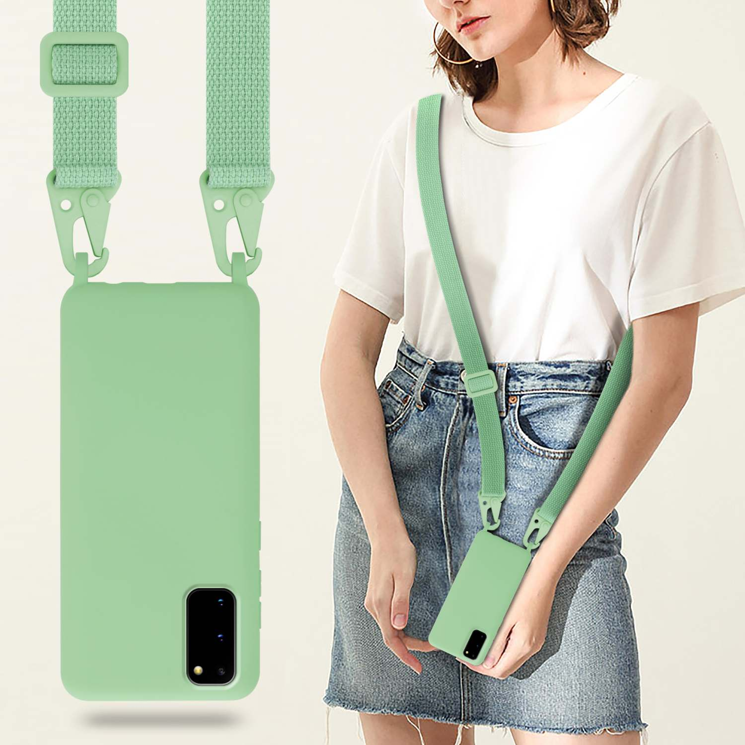 Una donna indossa una custodia per telefono verde con cinturino, il telefono e il cinturino sono appesi.