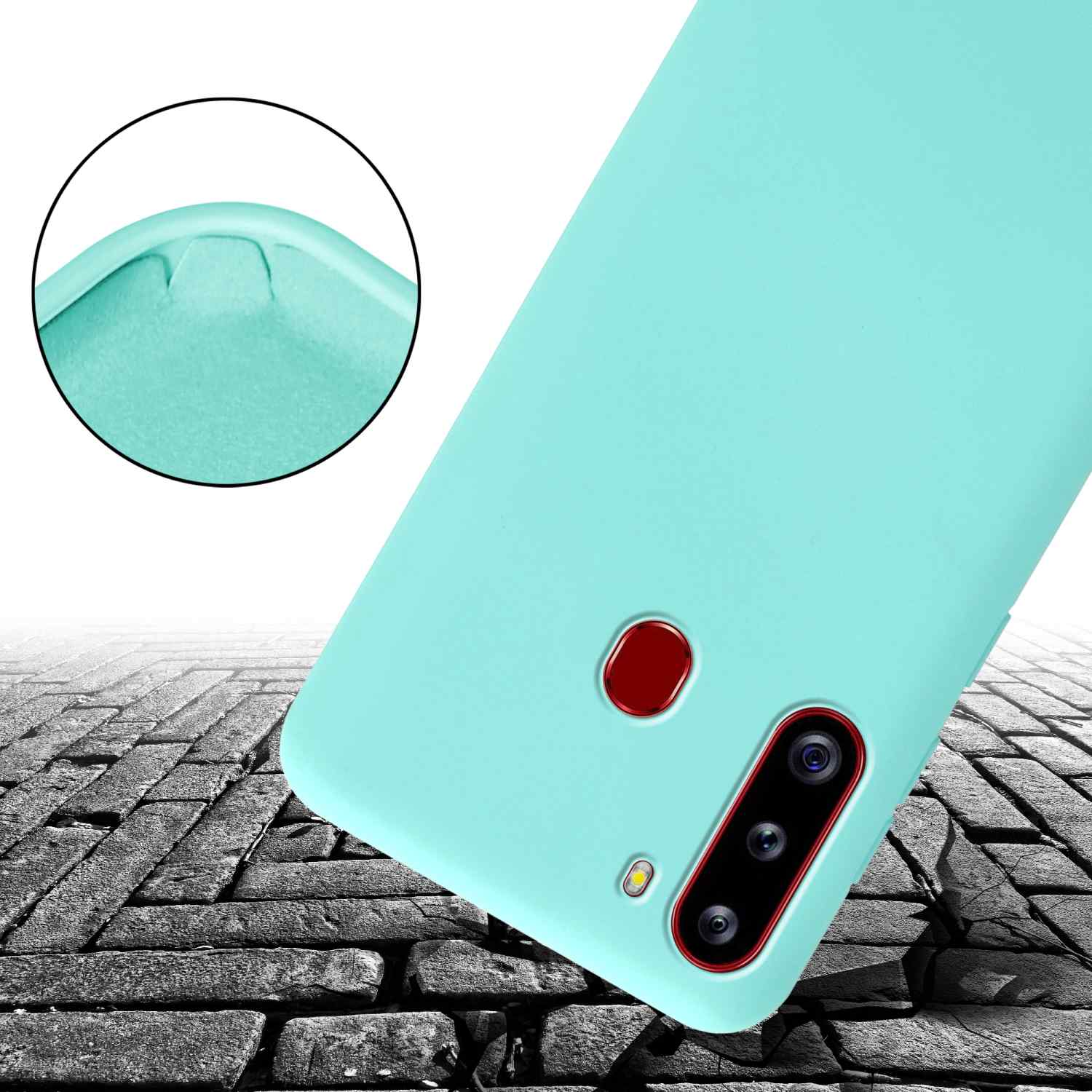Custodia per telefono verde acqua chiaro su terreno di mattoni. La custodia ha un ritaglio e un pulsante rosso.
