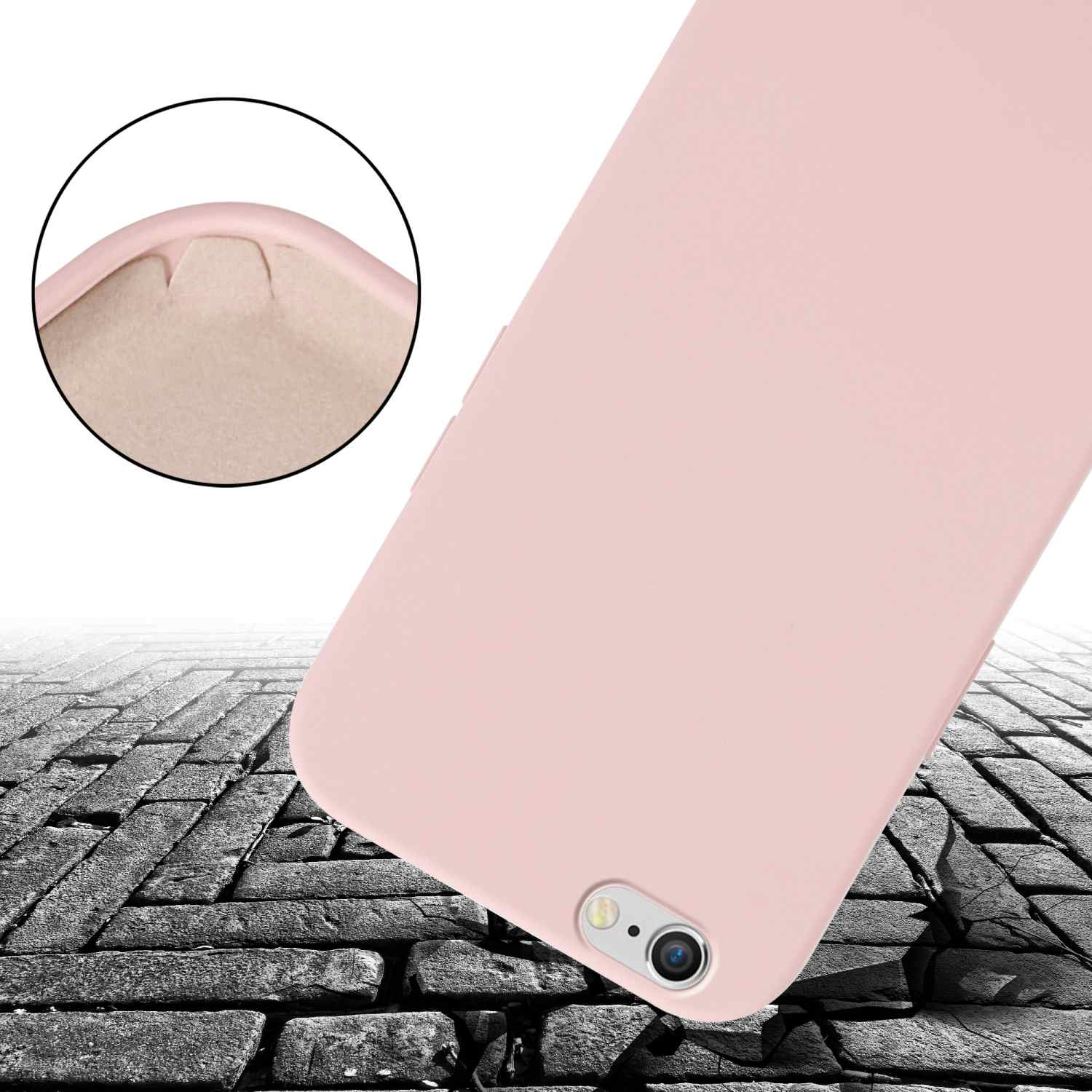 Custodia per telefono rosa su superficie di mattoni crepati. Primo piano mostra il retro con una fotocamera.