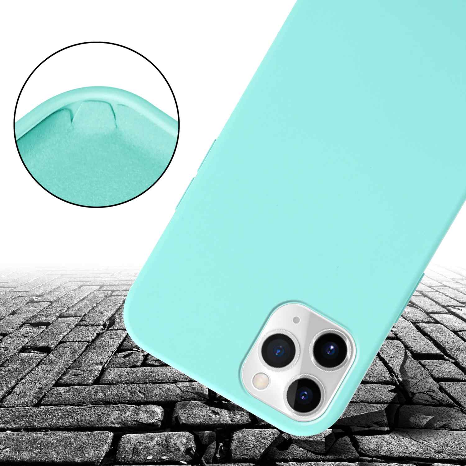 Hellblaue Handyhülle auf einer ziegelartigen Oberfläche, mit kreisförmigem Detail.