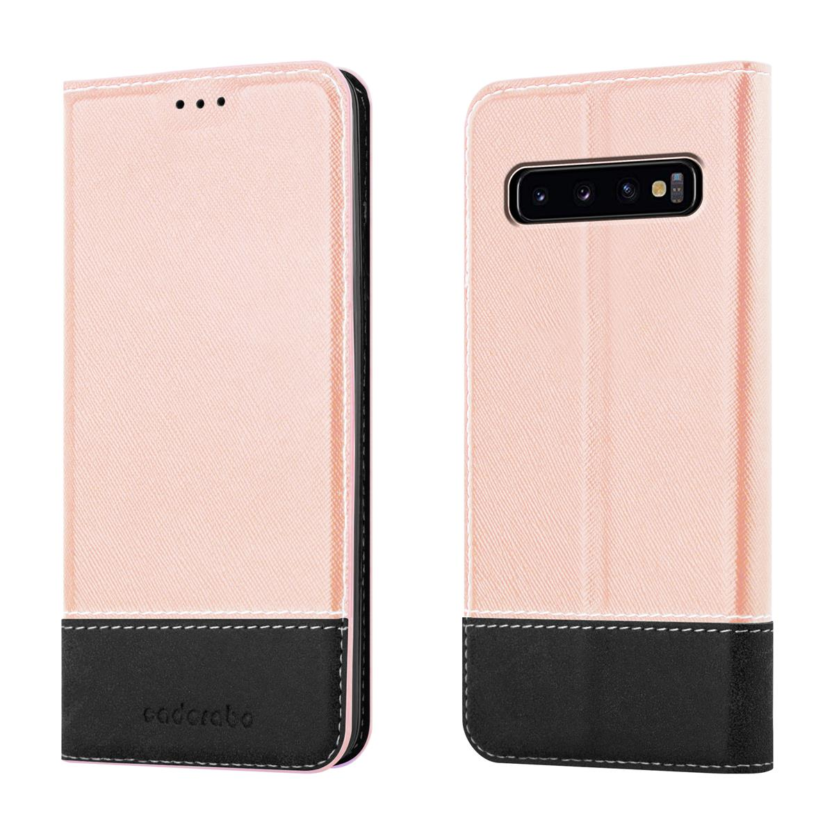 Custodia per telefono rosa con accenti neri. Custodia aperta con telefono all'interno. Sfondo bianco.