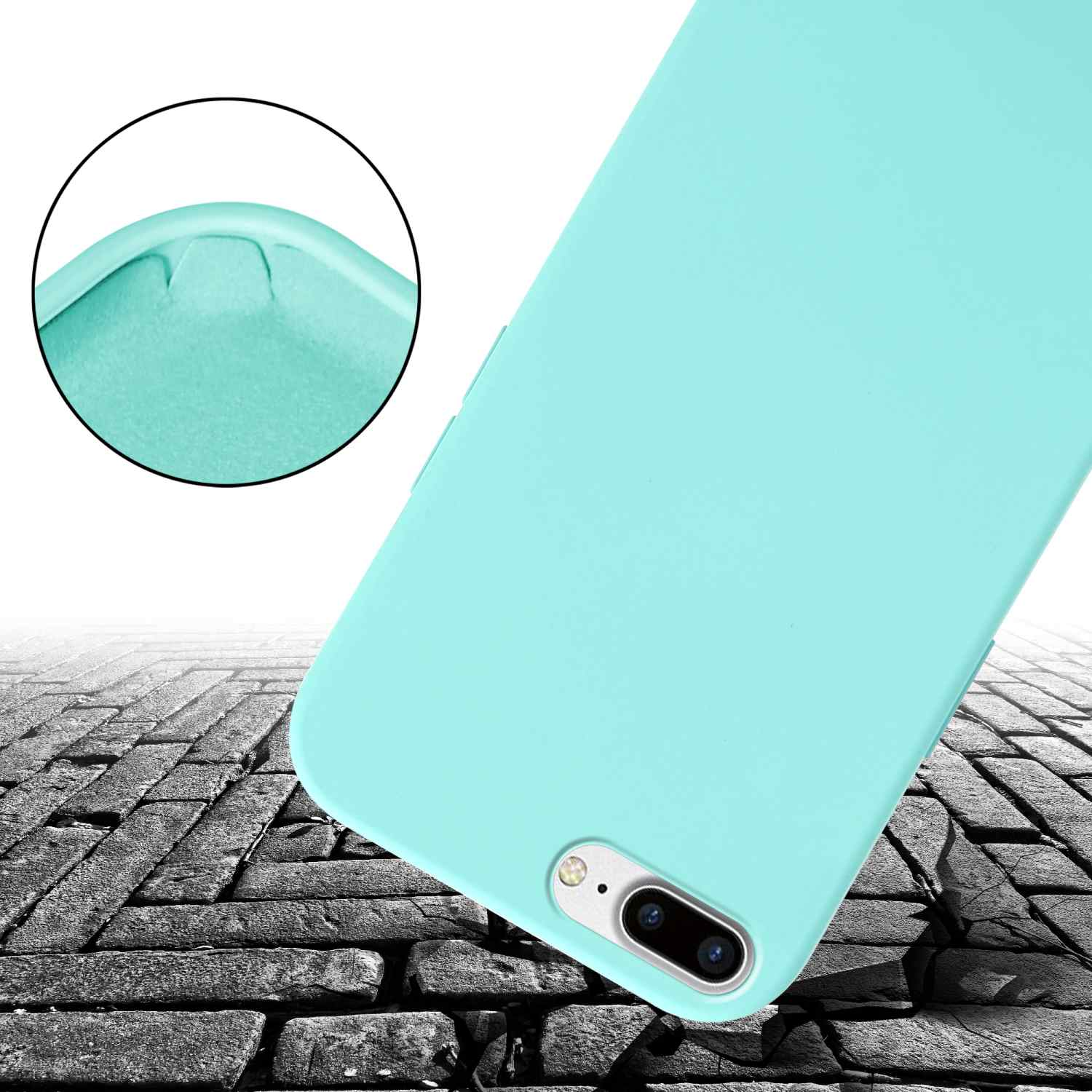 Custodia per telefono azzurra con fotocamera su superficie a mattoni, dettaglio circolare.