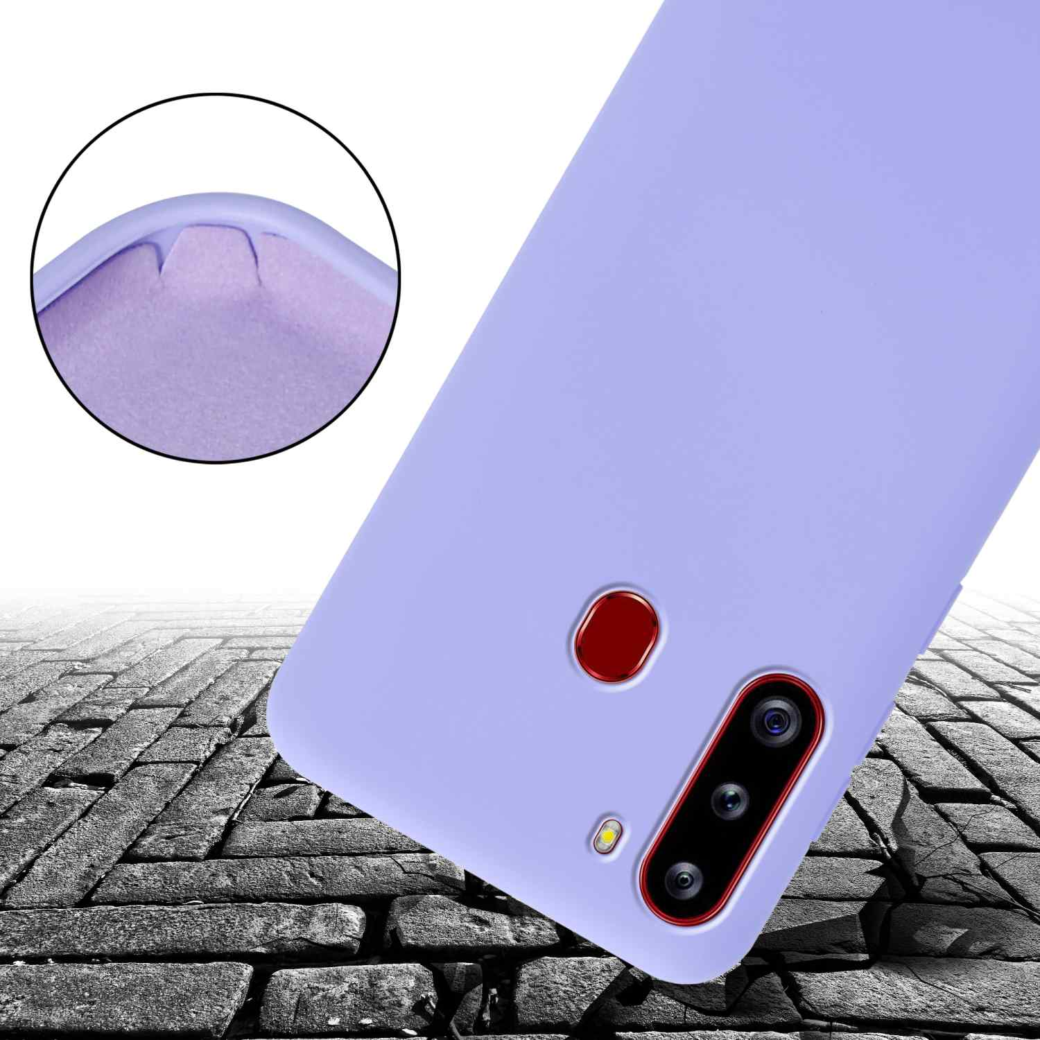 Custodia per telefono viola con fotocamera e pulsante rosso su superficie di mattoni.