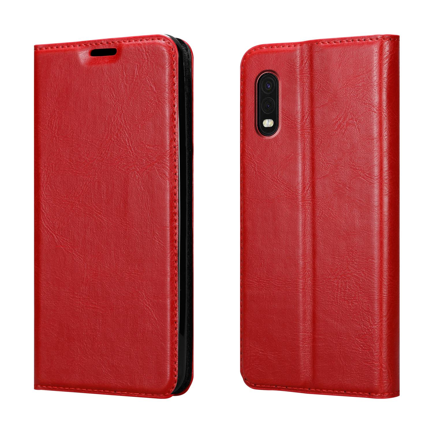 Custodia per telefono rossa, chiusa, con due viste. La custodia è realizzata in materiale strutturato.