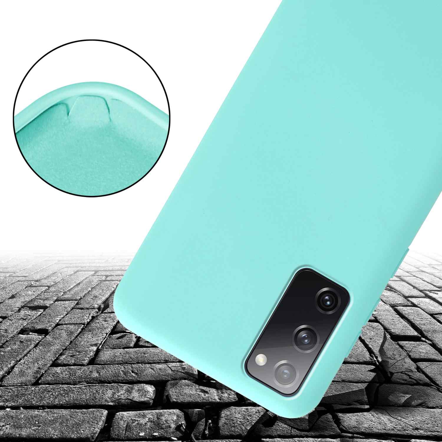 Custodia per telefono verde menta, primo piano, su uno sfondo di mattoni.