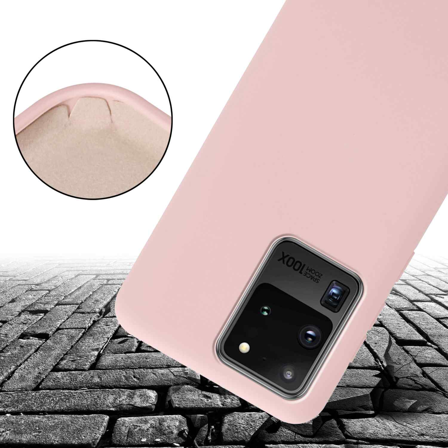 Custodia rosa, con sporgenza della fotocamera. La custodia è su un pavimento di mattoni. Il telefono è inclinato.